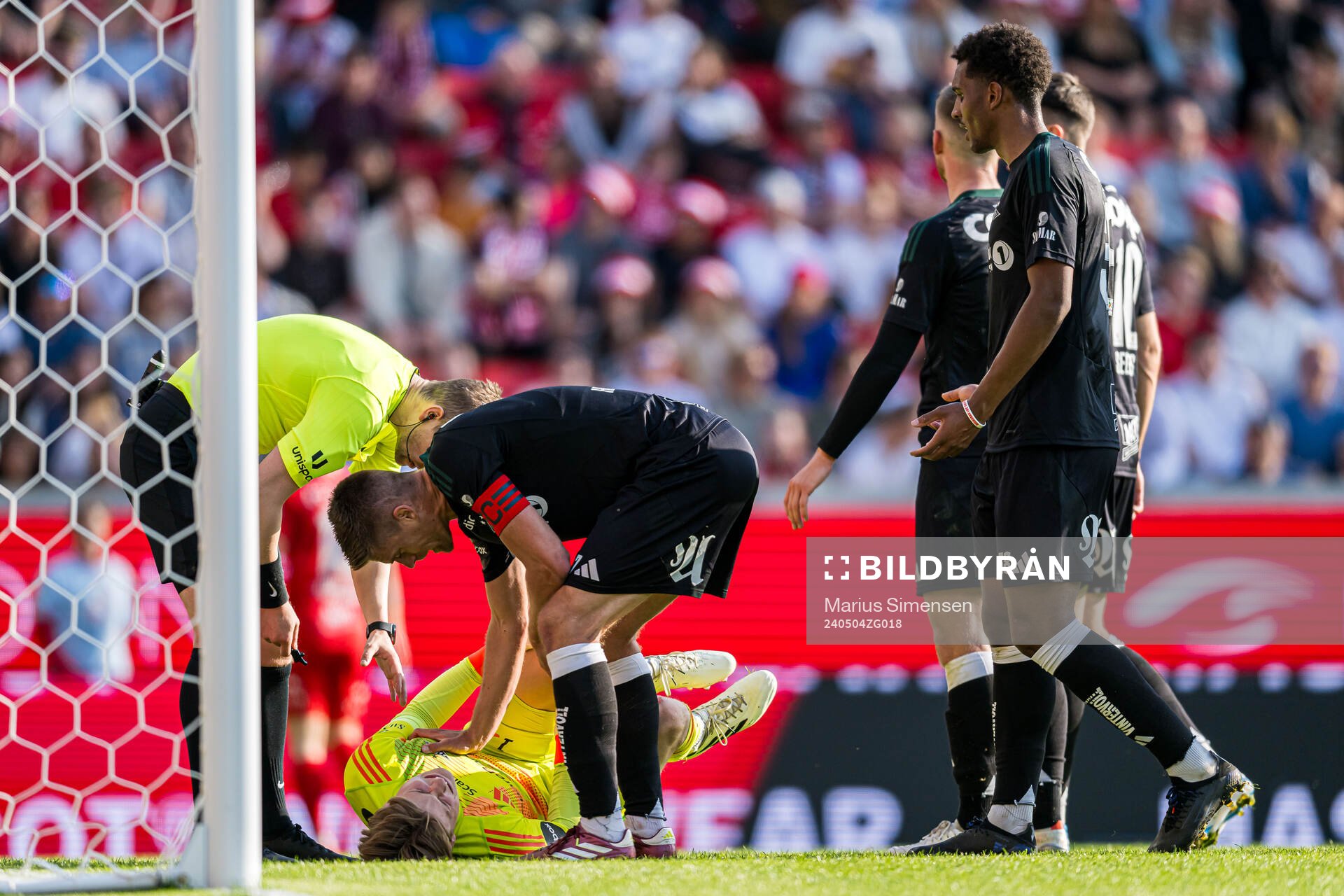 Sander Tangvik of Rosenborg with an injury