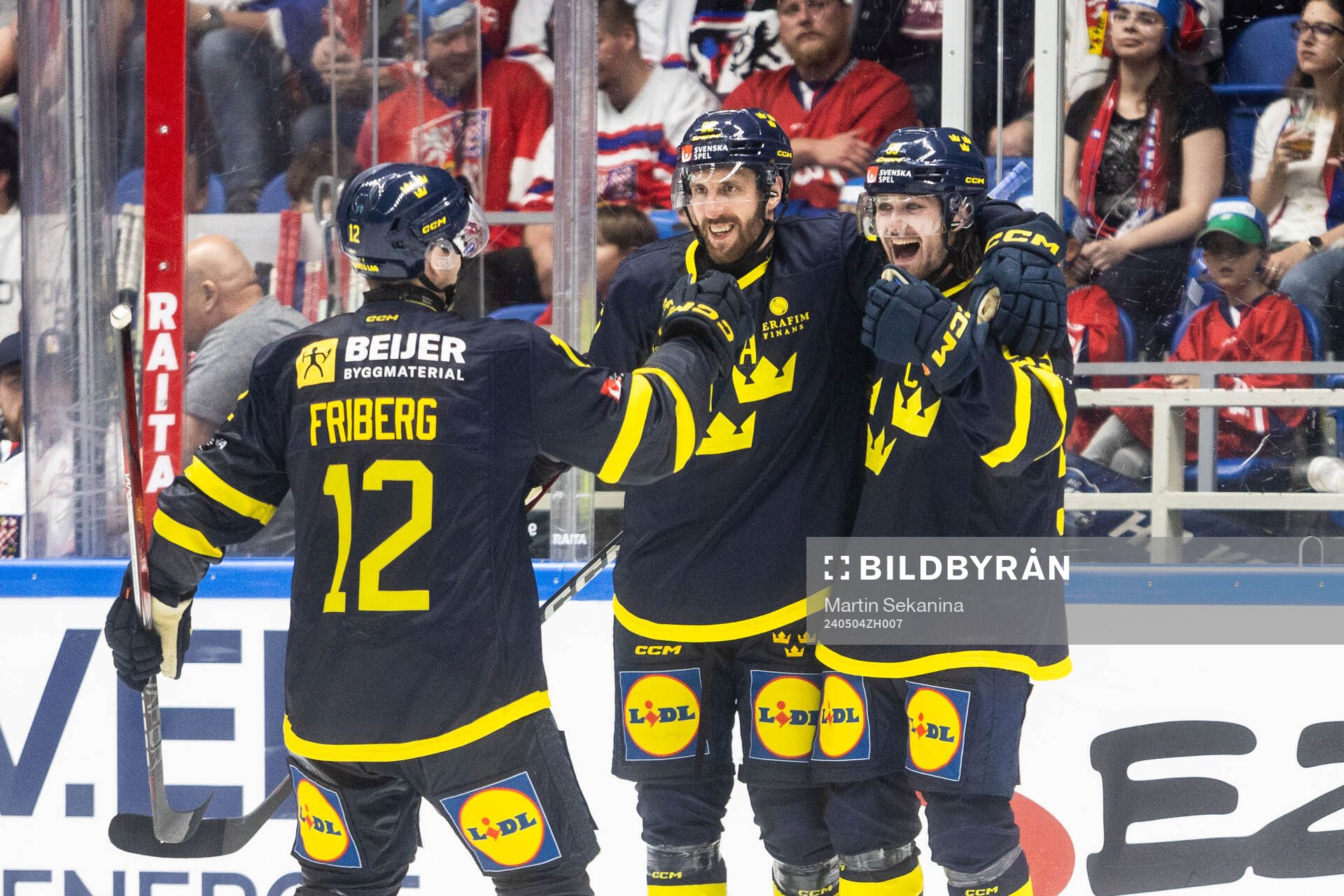 Linus Johansson of Sweden celebrates with Max Friberg and