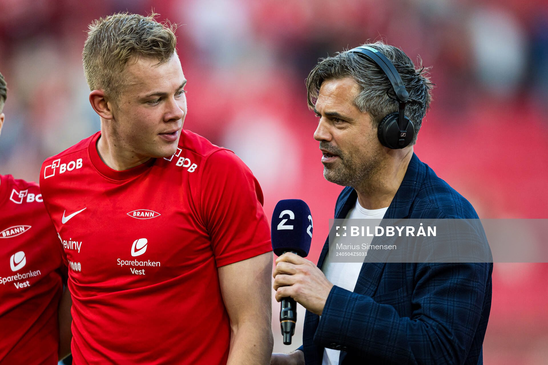 Aune Heggebø of Brann and Jan-Henrik Børslid of TV 2 the