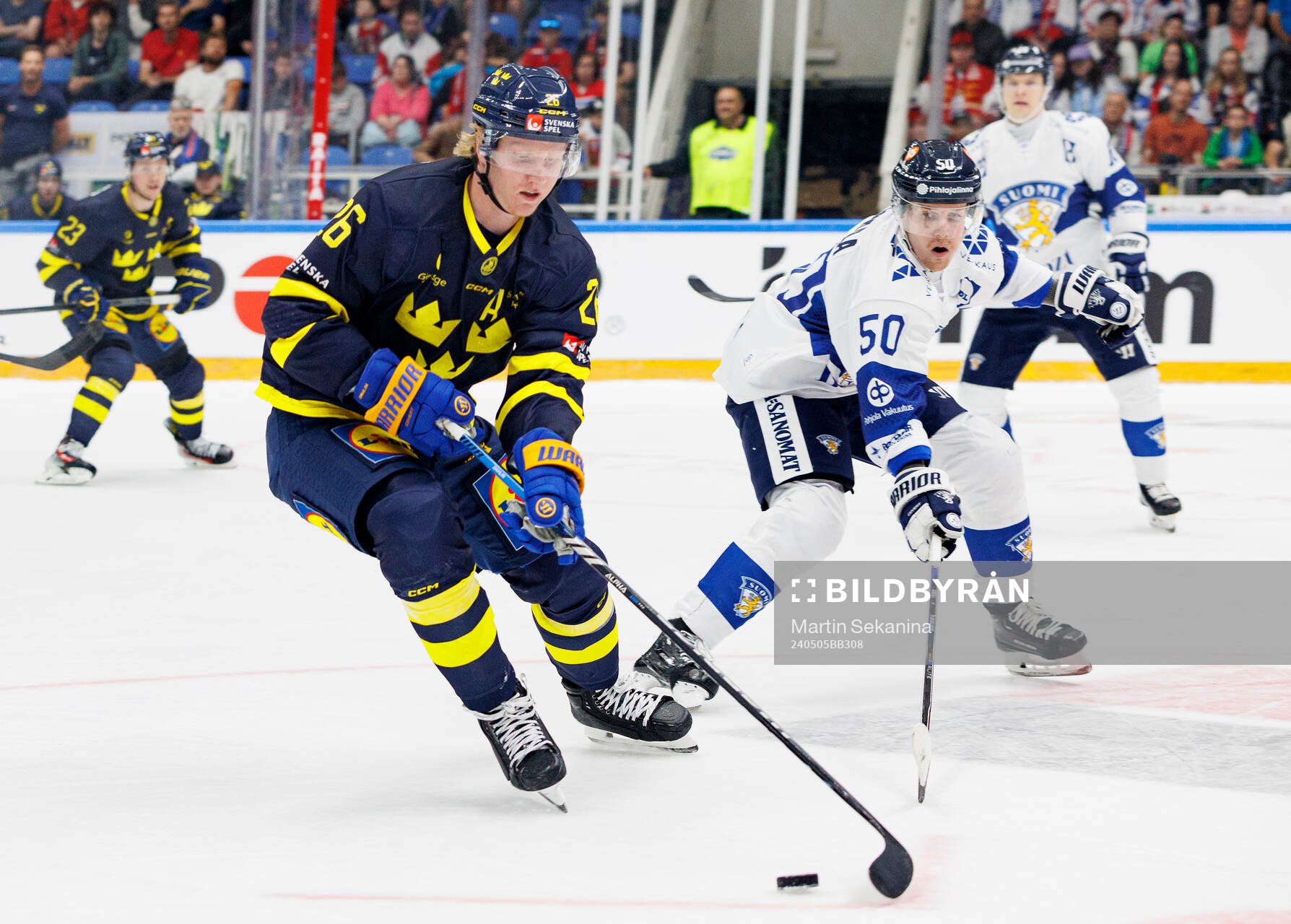 Rasmus Dahlin of Sweden and Juuso Riikola of Finland
