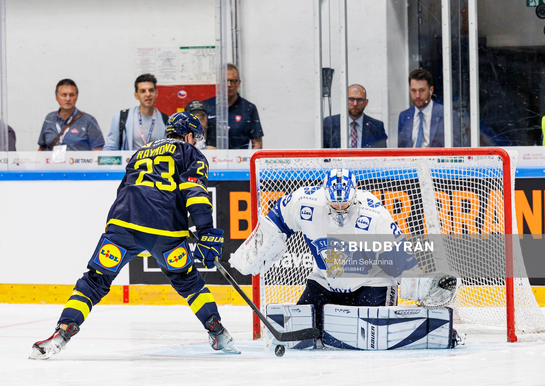 Lucas Raymond of Sweden and goaltender Harri Säteri of