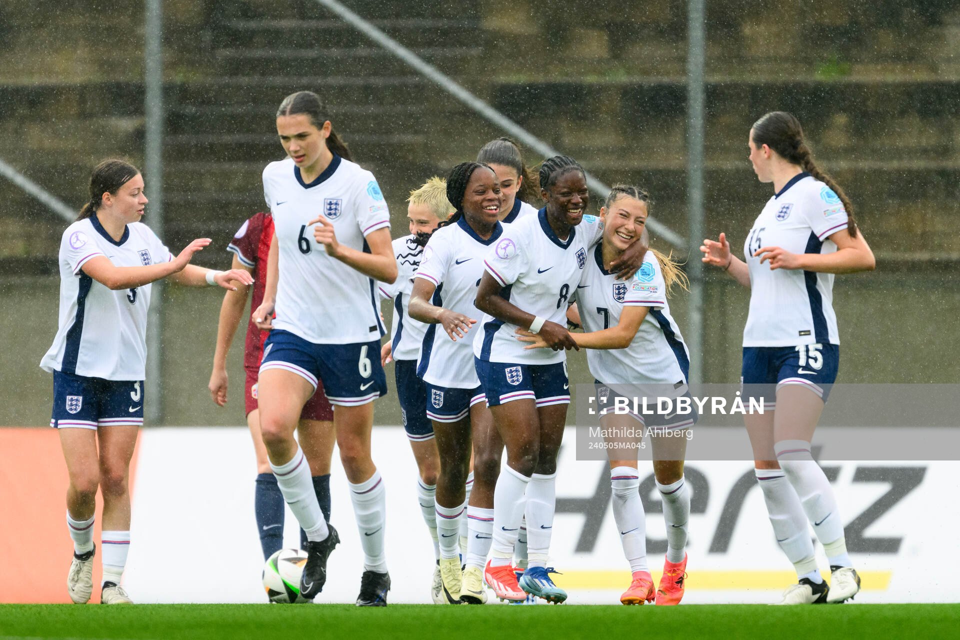 Omotara Junaid and Erica Parkinson of England celebrate the