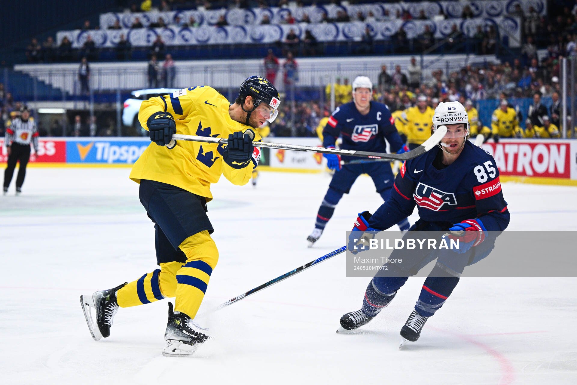 André Burakovsky of Sweden and Jake Sanderson of USA