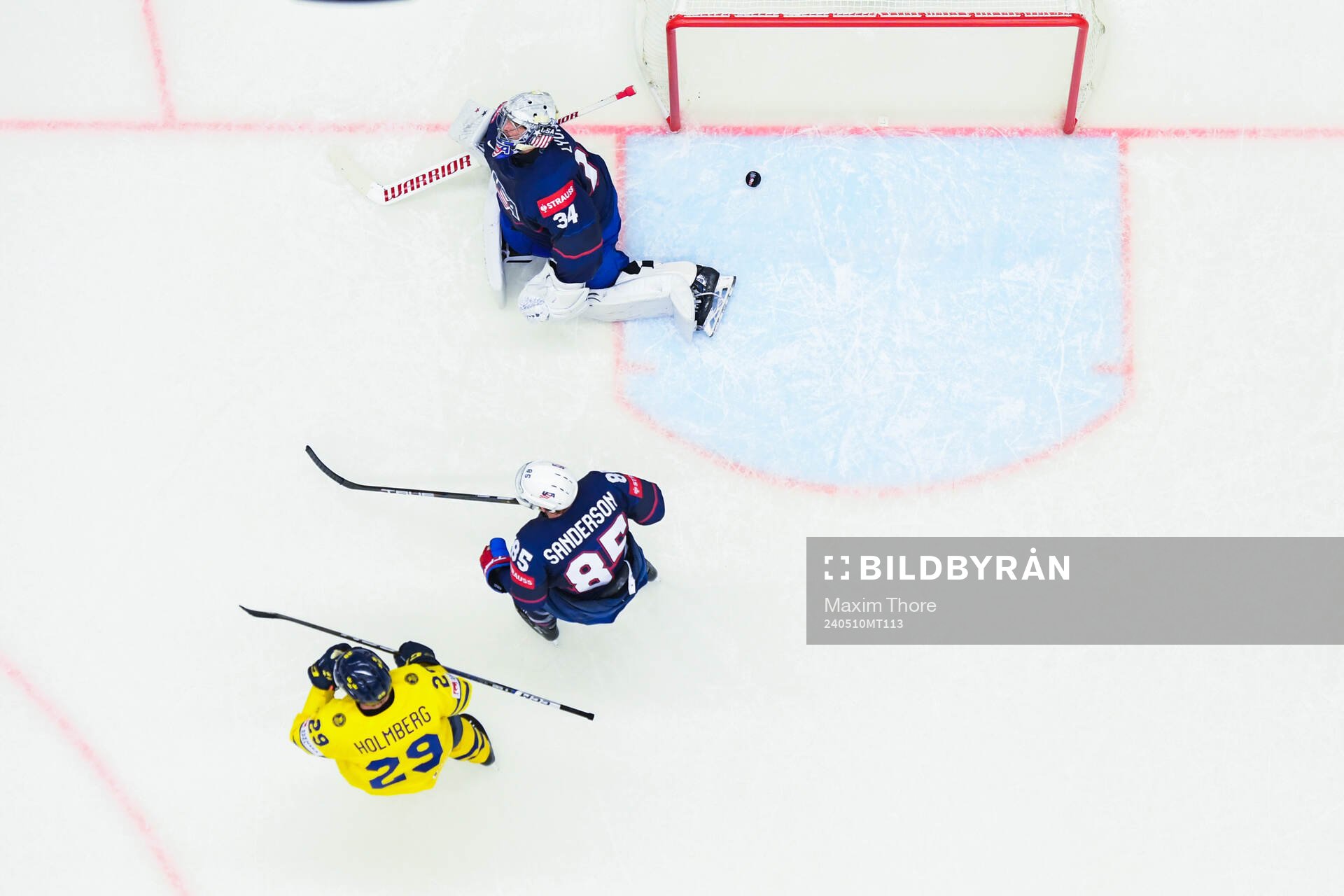 Goaltender Alex Lyon of USA looks dejected