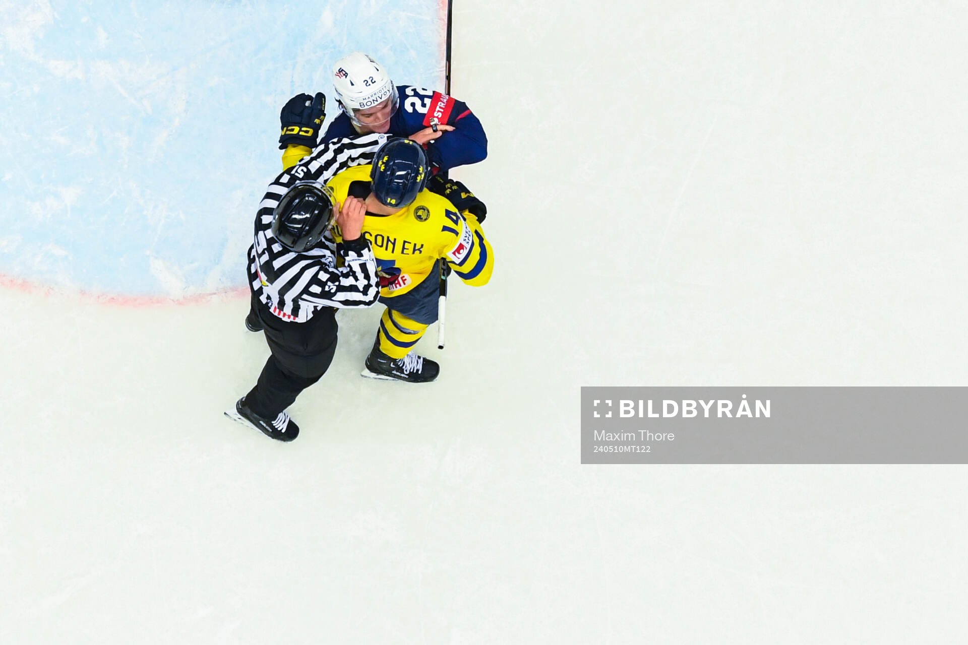 Cole Caufield of USA and Joel Eriksson Ek of Sweden