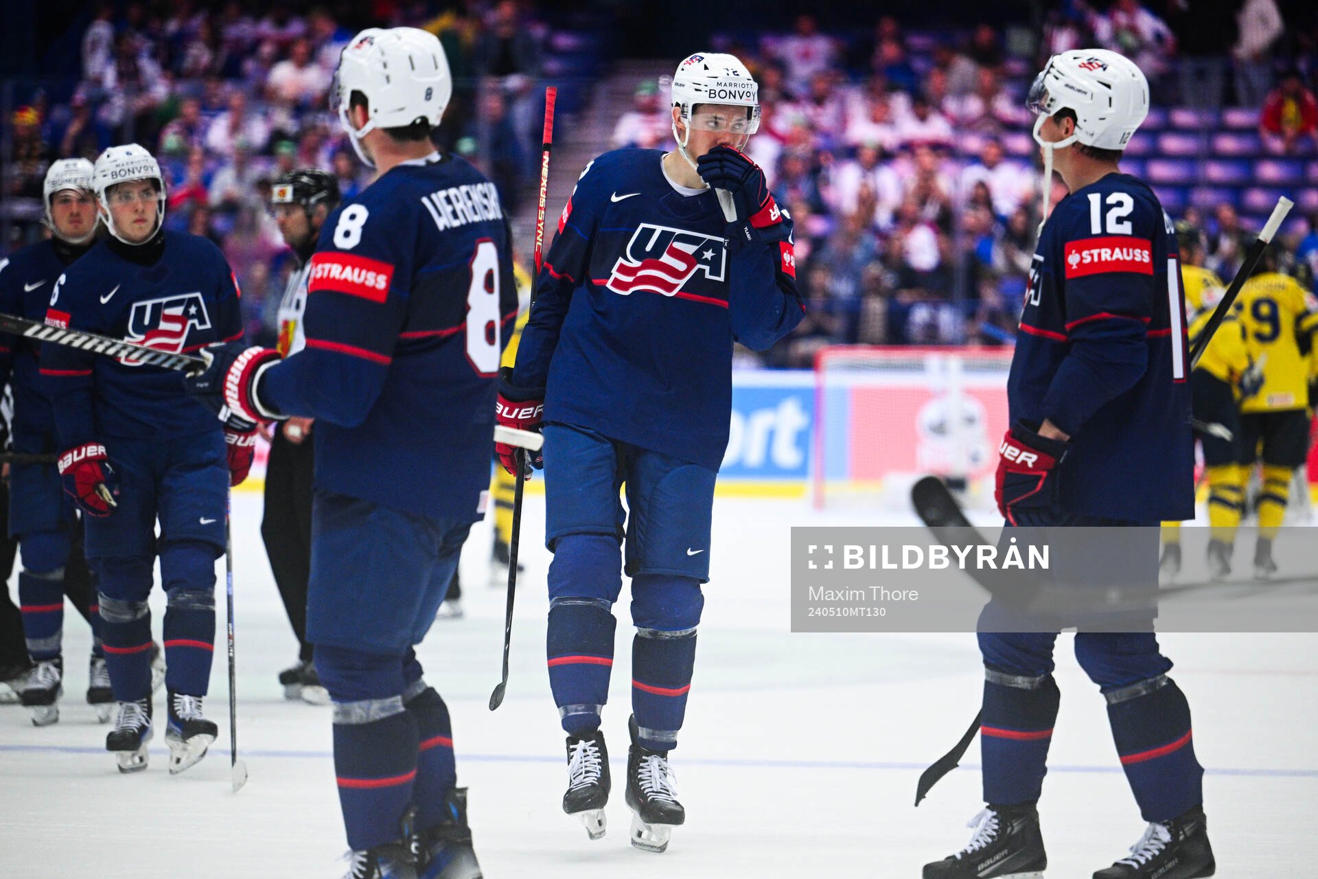 Alex Vlasic of USA looks dejected