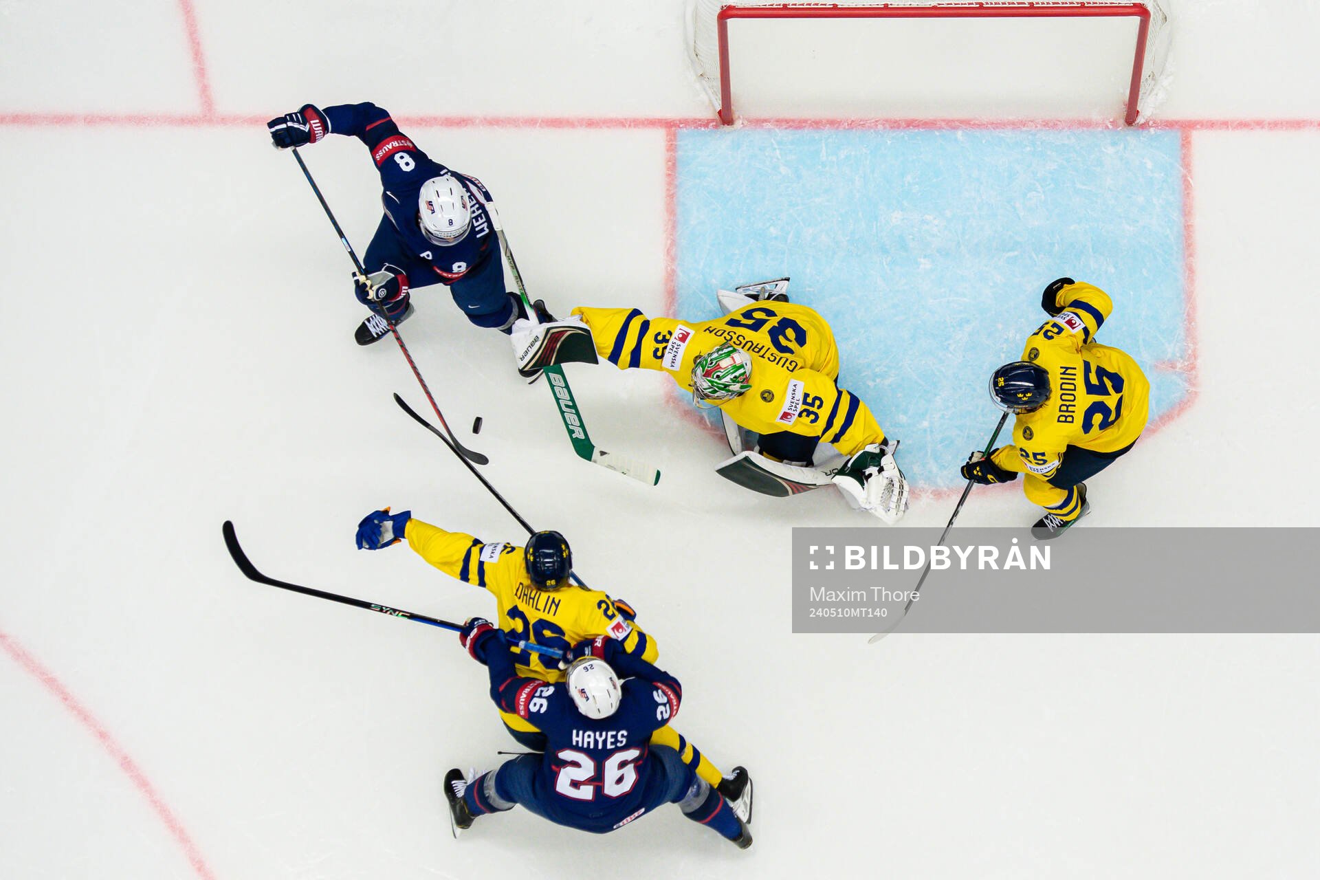 Zach Werenski and Kevin Hayes of USA against Rasmus Dahlin,