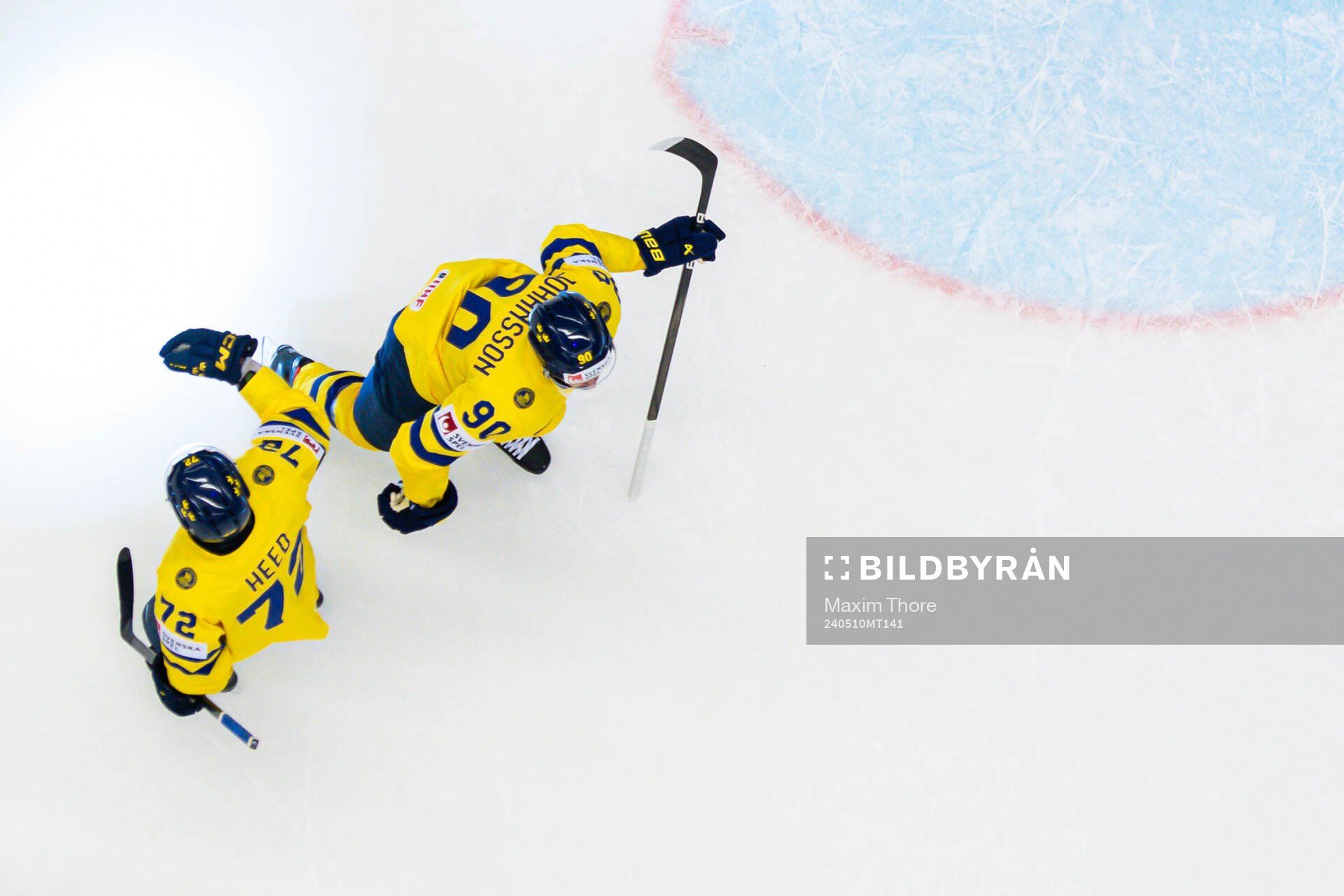 Tim Heed and Marcus Johansson of Sweden celebrate the 3-1