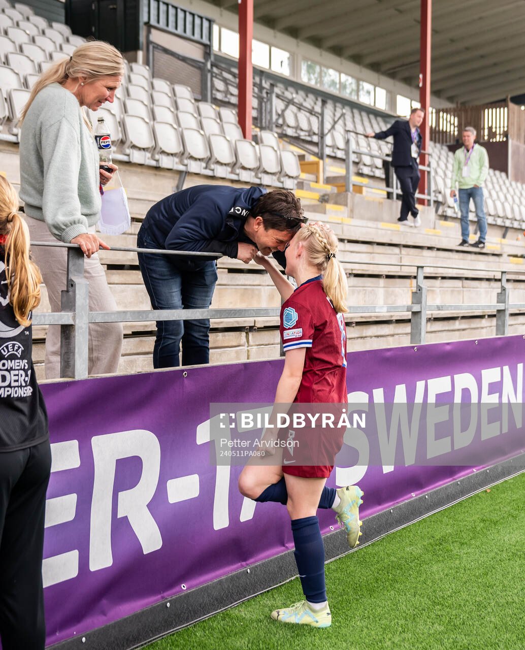 Linnea Holmesveen Moen of Norway with family in the stands