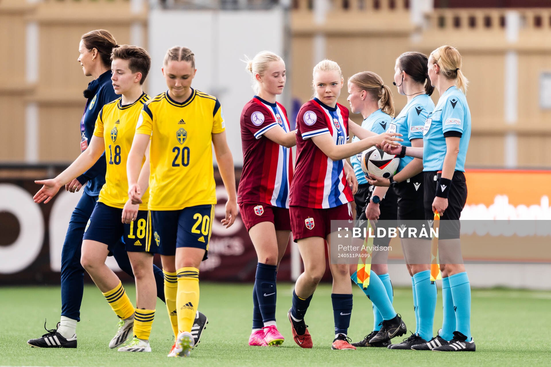 Tommine Enger and Anny Kerim-Lindland of Norway shaking hands with referee Lotta Vuorio with assistant referees Katrine Stensholm and Martina Boer after the UEFA European Women’s Under-17 Championship match between Norway and Sweden on May 11, 2024 in Malmö.