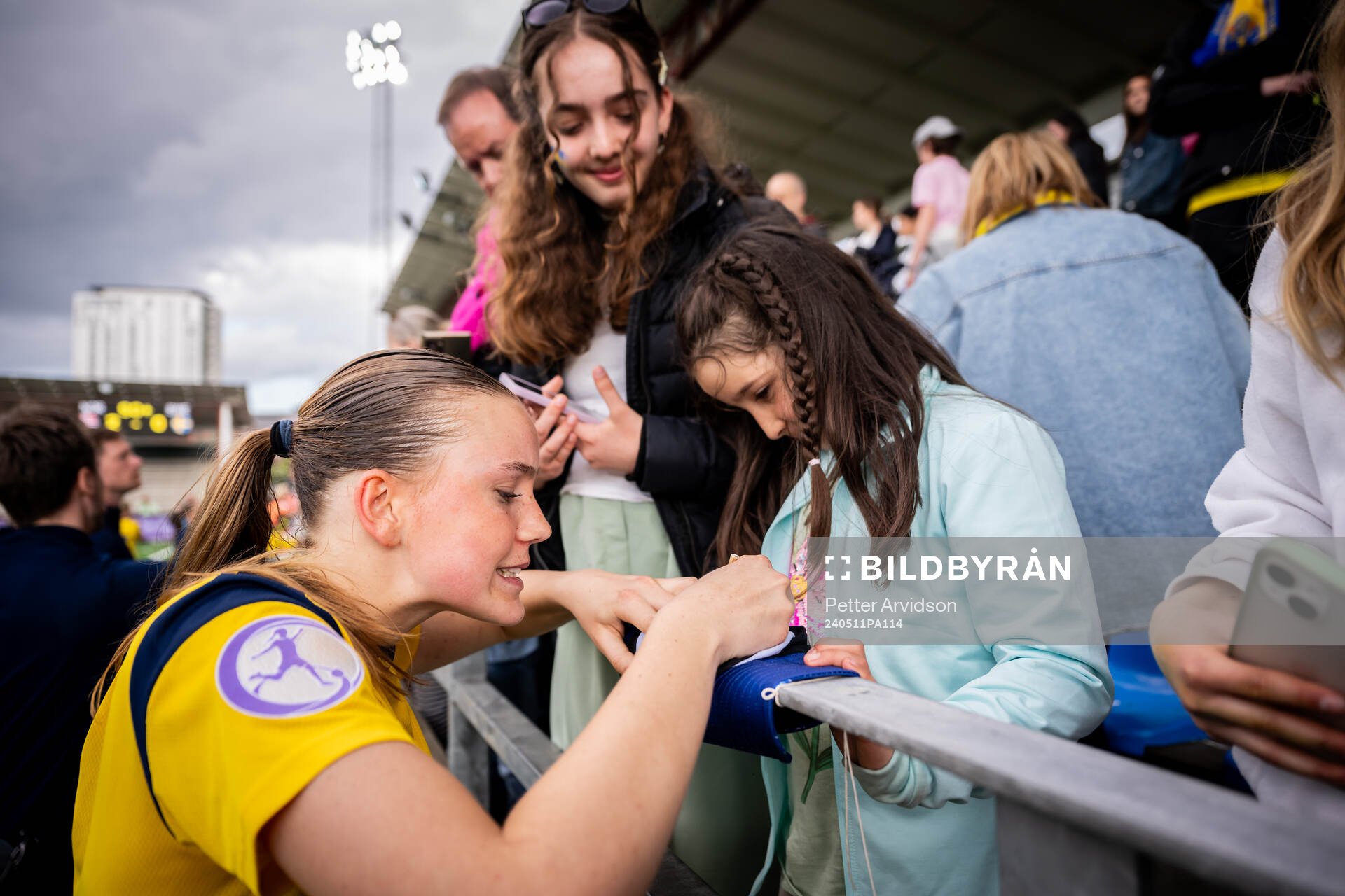 Fabienne Bartholdson of Sweden signing autographs to fans