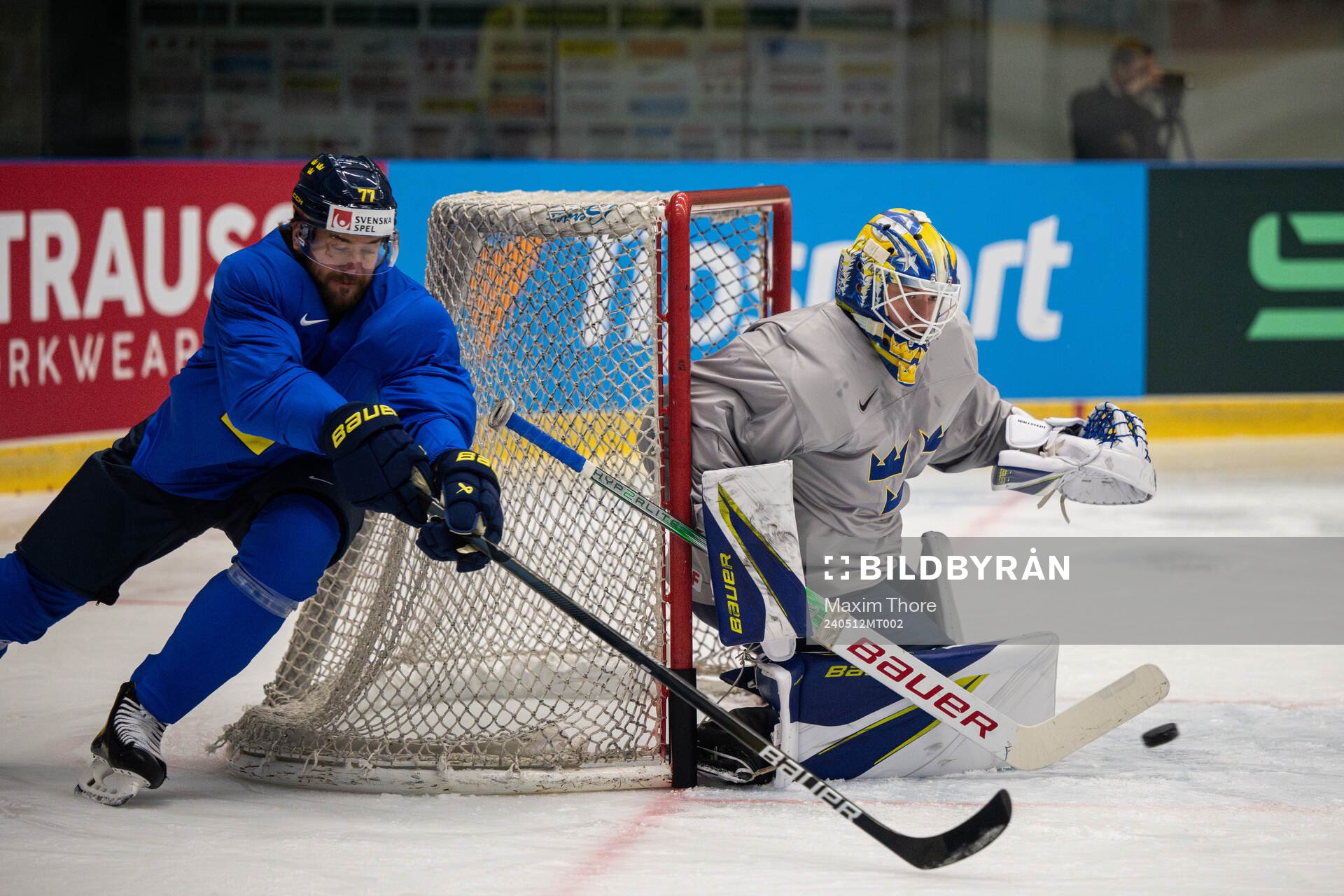 Victor Hedman and goaltender Jesper Wallstedt of Sweden at