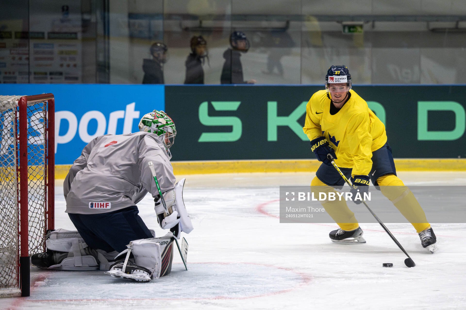 Goaltender Filip Gustavsson and Isac Lundeström of Sweden