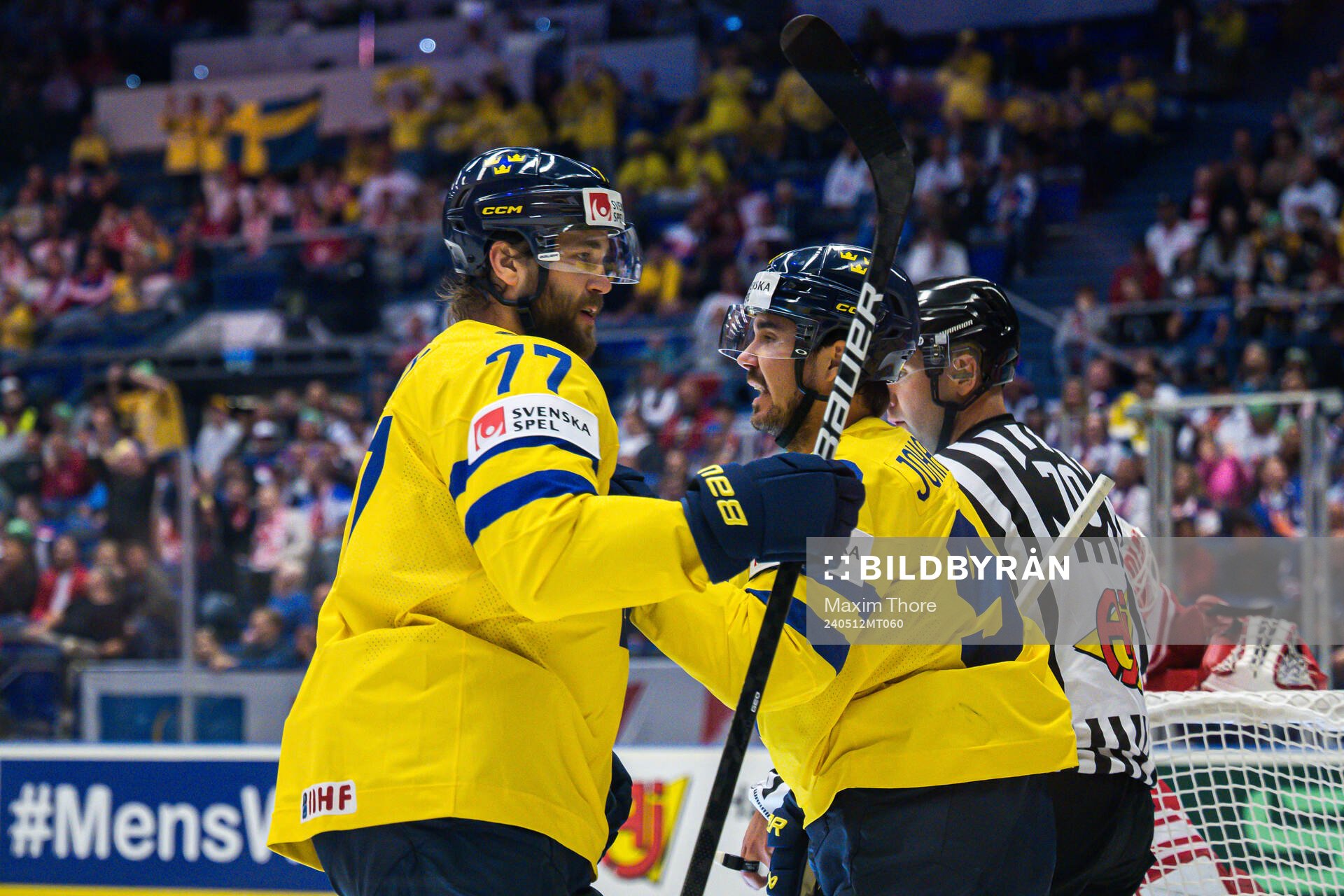 Victor Hedman and Marcus Johansson of Sweden celebrate