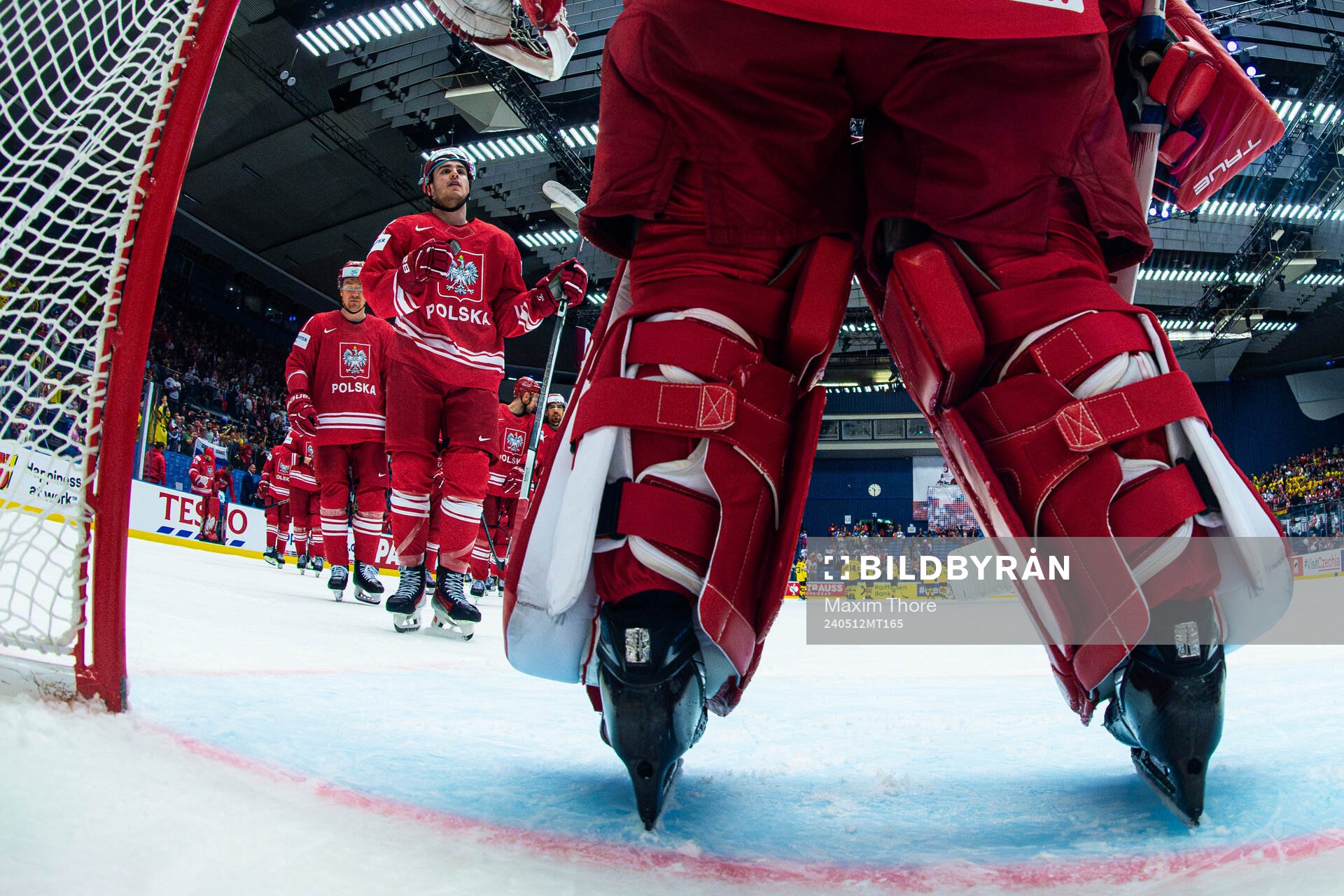 Players of Poland thank goaltender David Zabolotny