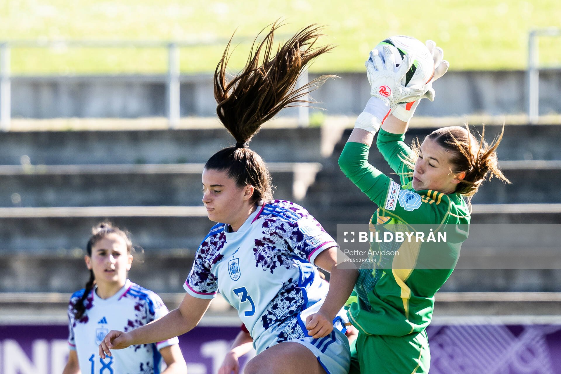 Nerea Carmona of Spain in action with goalkeeper Aude