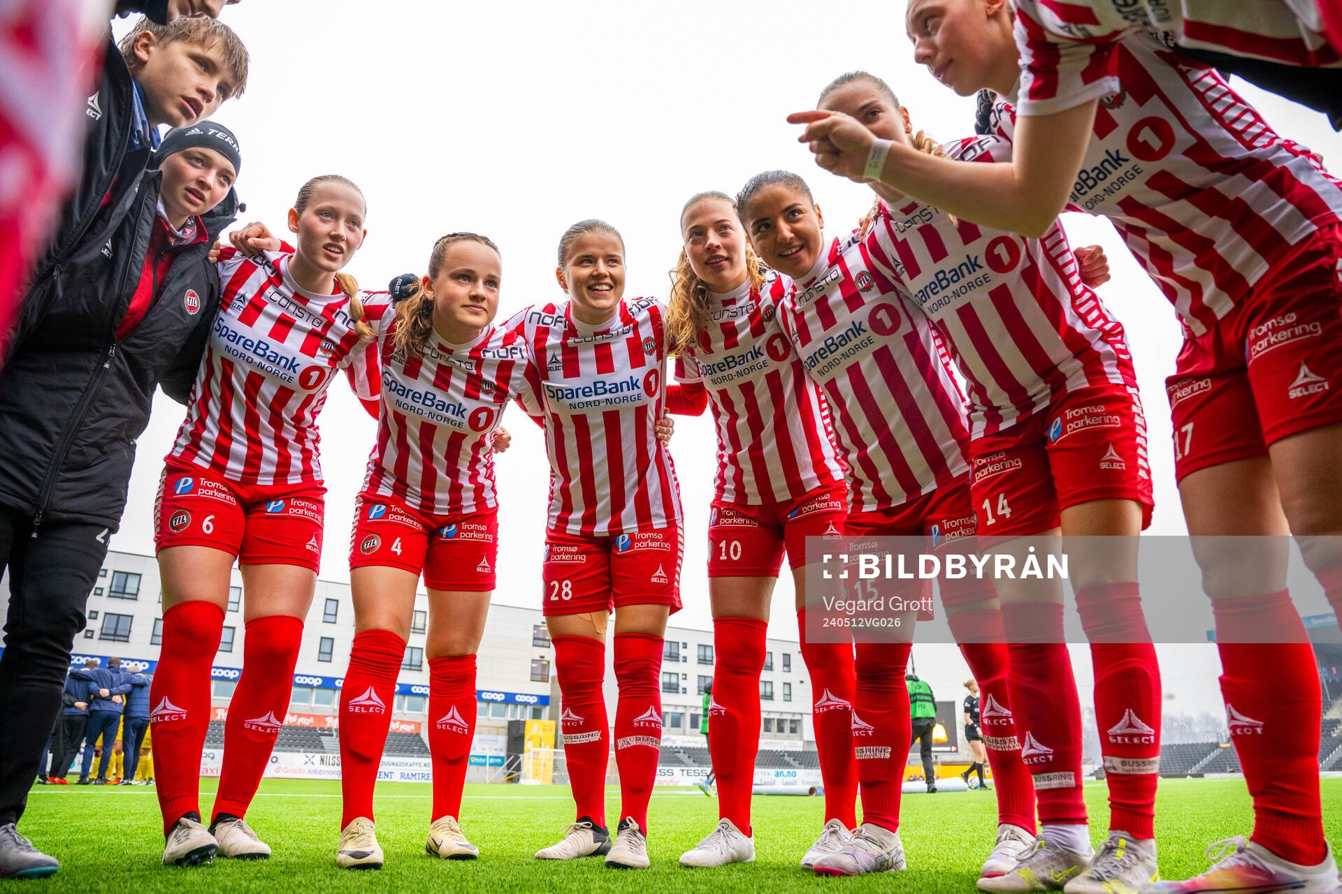 Emilie Sofie Ludvigsen, Casandra Luthcke, Mali Motrøen Trøan, Emma Granlind, Anfal el Yamani Haida, Nora Hegg and players of TIL 2020 gather in a circle ahead of the 1. division football match between Bodø/Glimt and TIL 2020 on May 12, 2024 in Bodø.