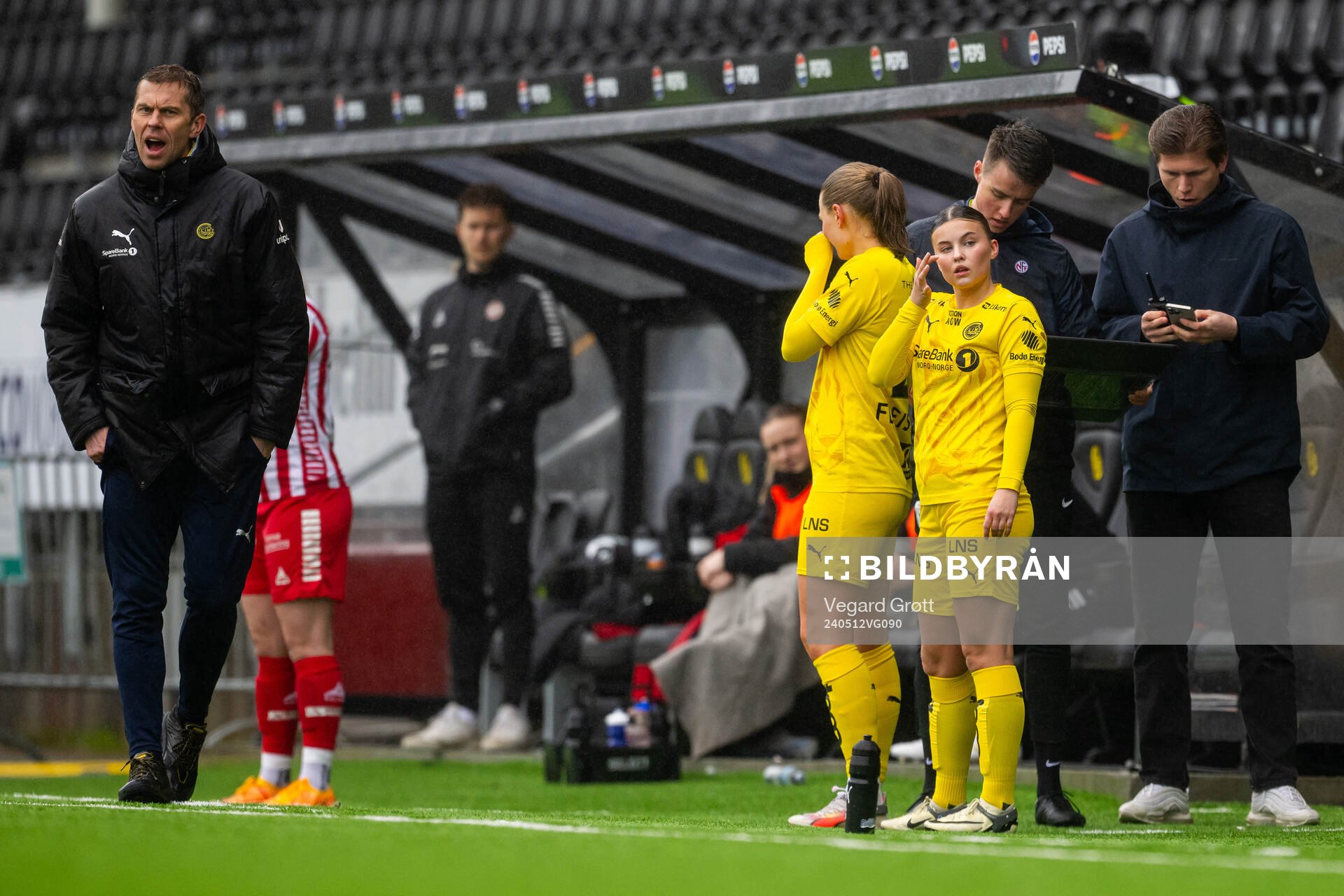 Stian Theting, head coach of Bodø/Glimt, and Mathea Meyer Theting of Bodø/Glimt during the 1. division football match between Bodø/Glimt and TIL 2020 on May 12, 2024 in Bodø.