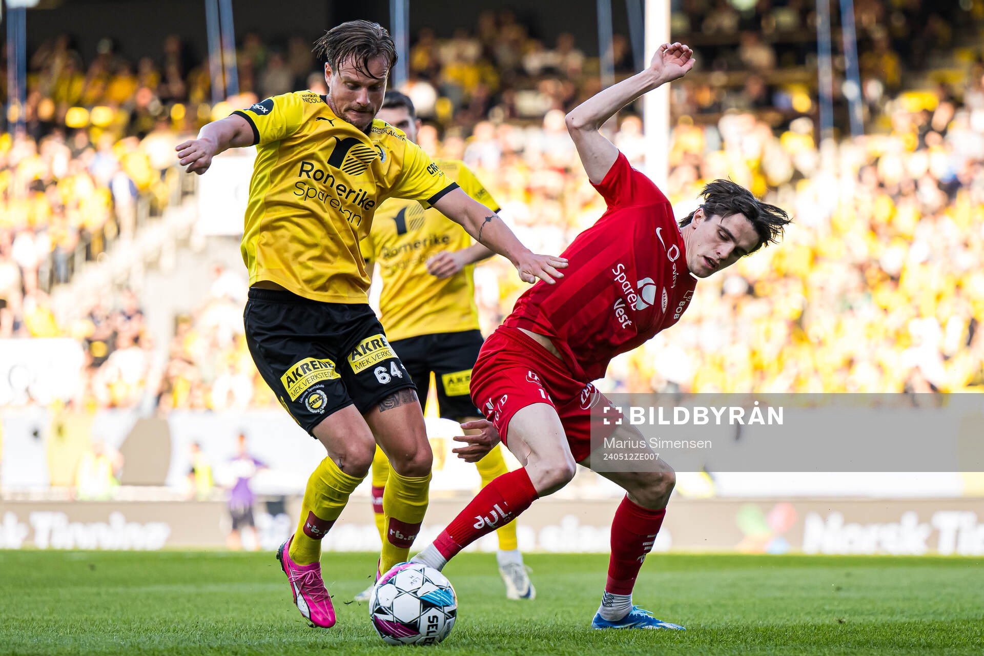 Jan Eric Anton Larsson of Lillestrøm and Ulrik Mathisen of Brann during the Eliteserien match between Lillestrøm and Brann on May 12, 2024 in Lillestrøm.