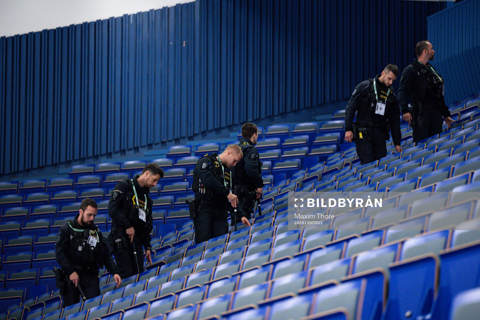 The police search the arena for suspicious objects