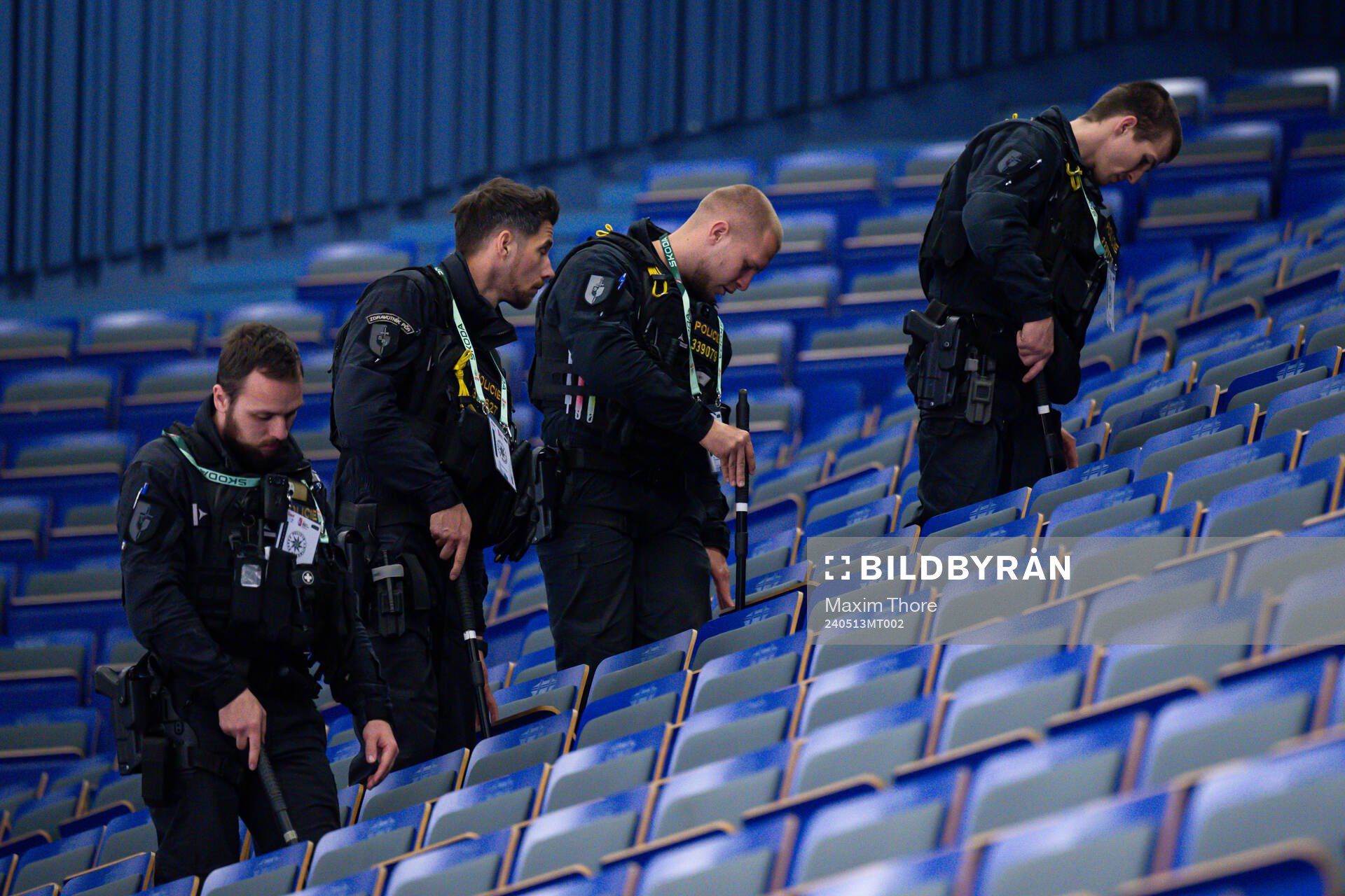 The police search the arena for suspicious objects