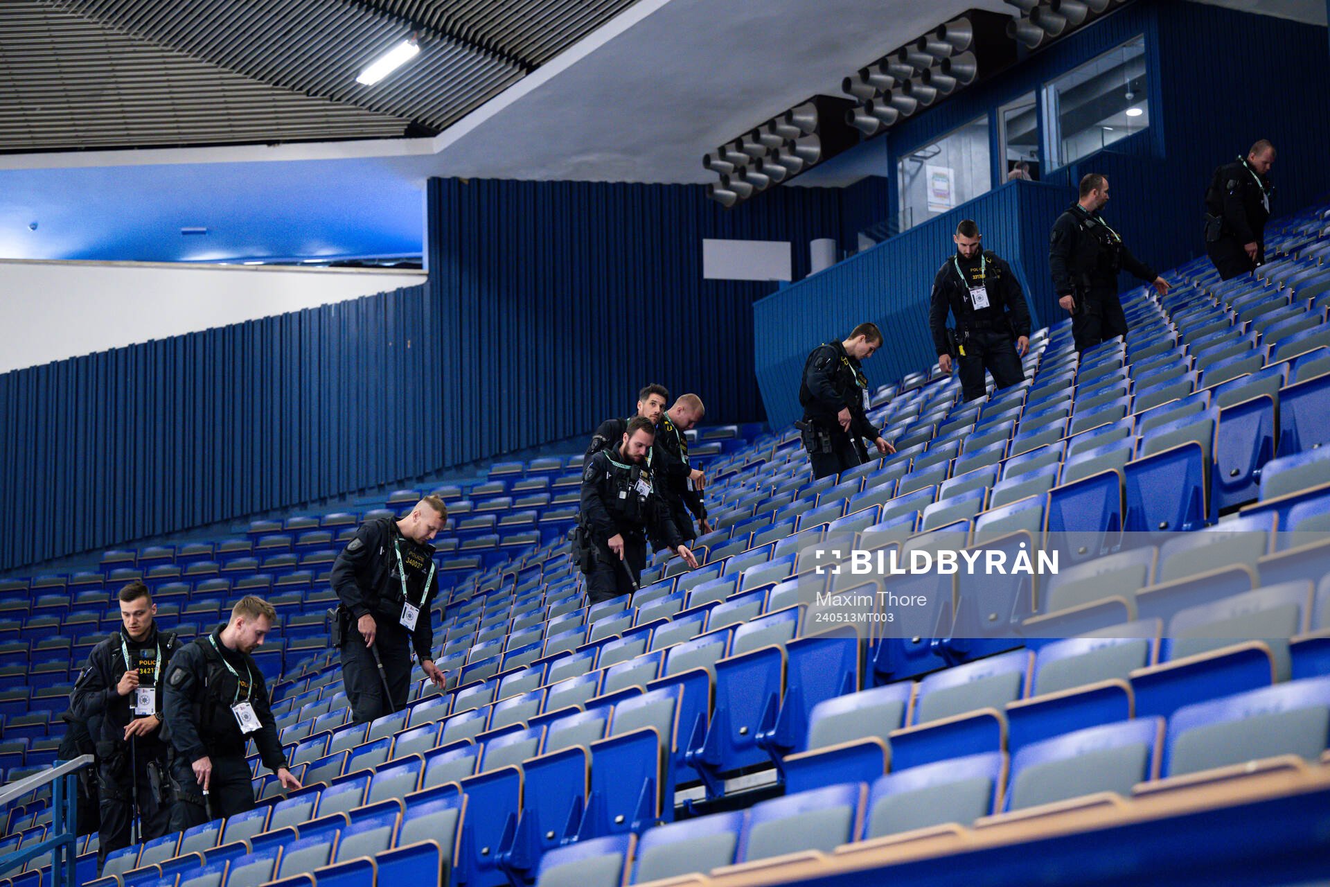 The police search the arena for suspicious objects
