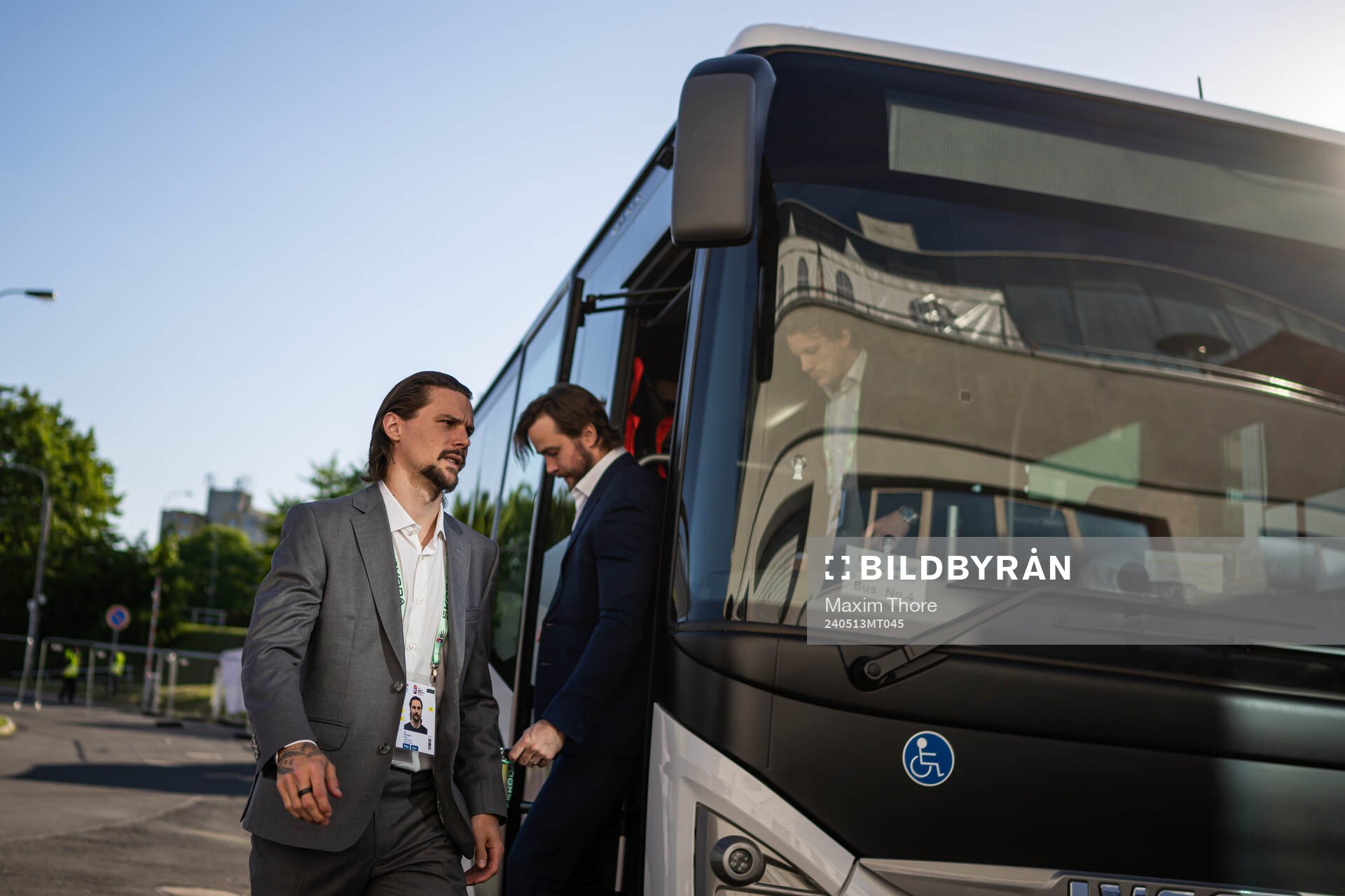 Victor Hedman and Erik Karlsson of Sweden arrive to the