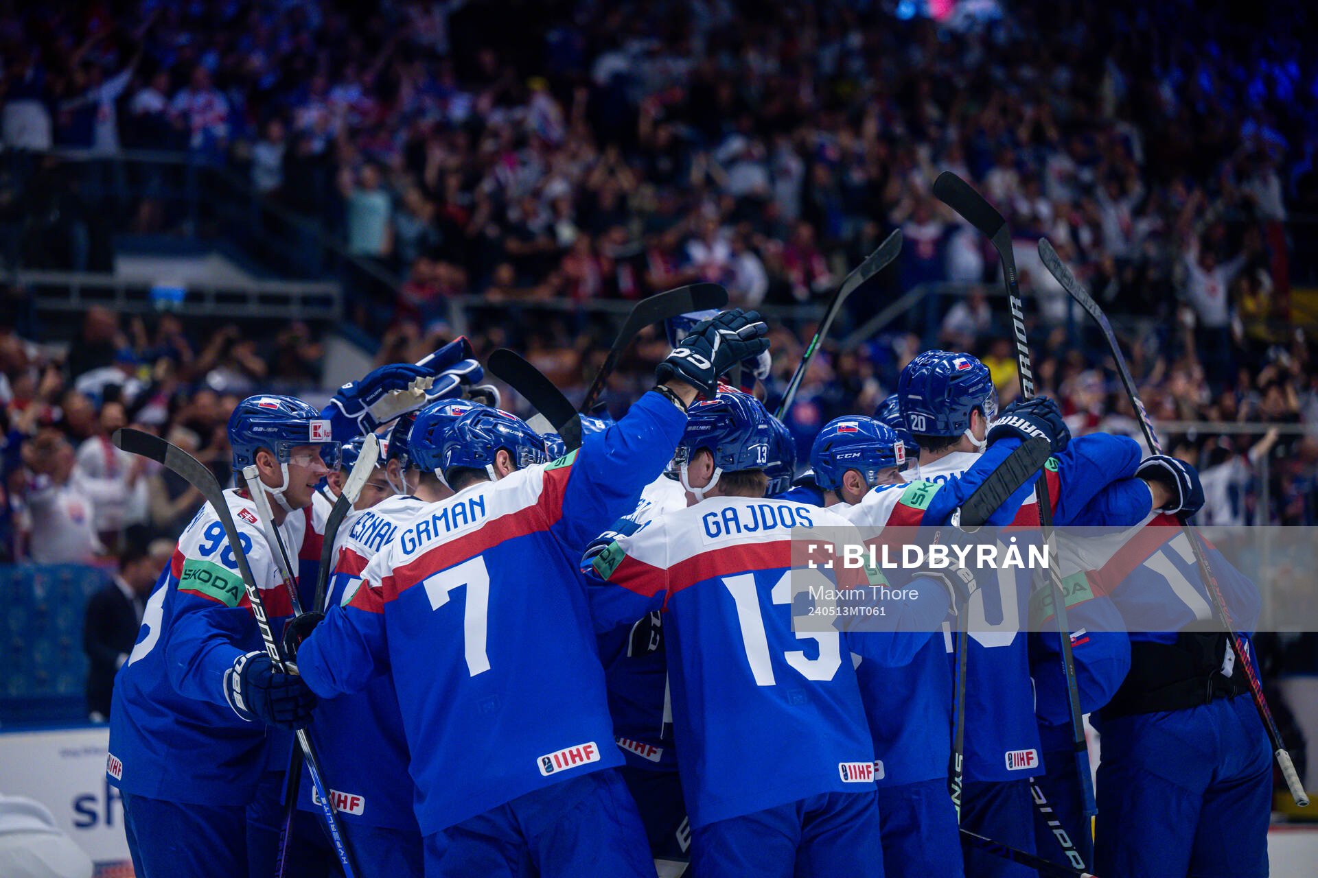 Players of Slovakia celebrate the overtime win