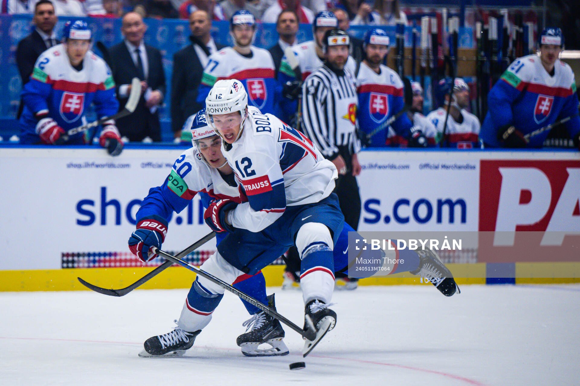 Juraj Slafkovsky of Slovakia and Matt Boldy of USA