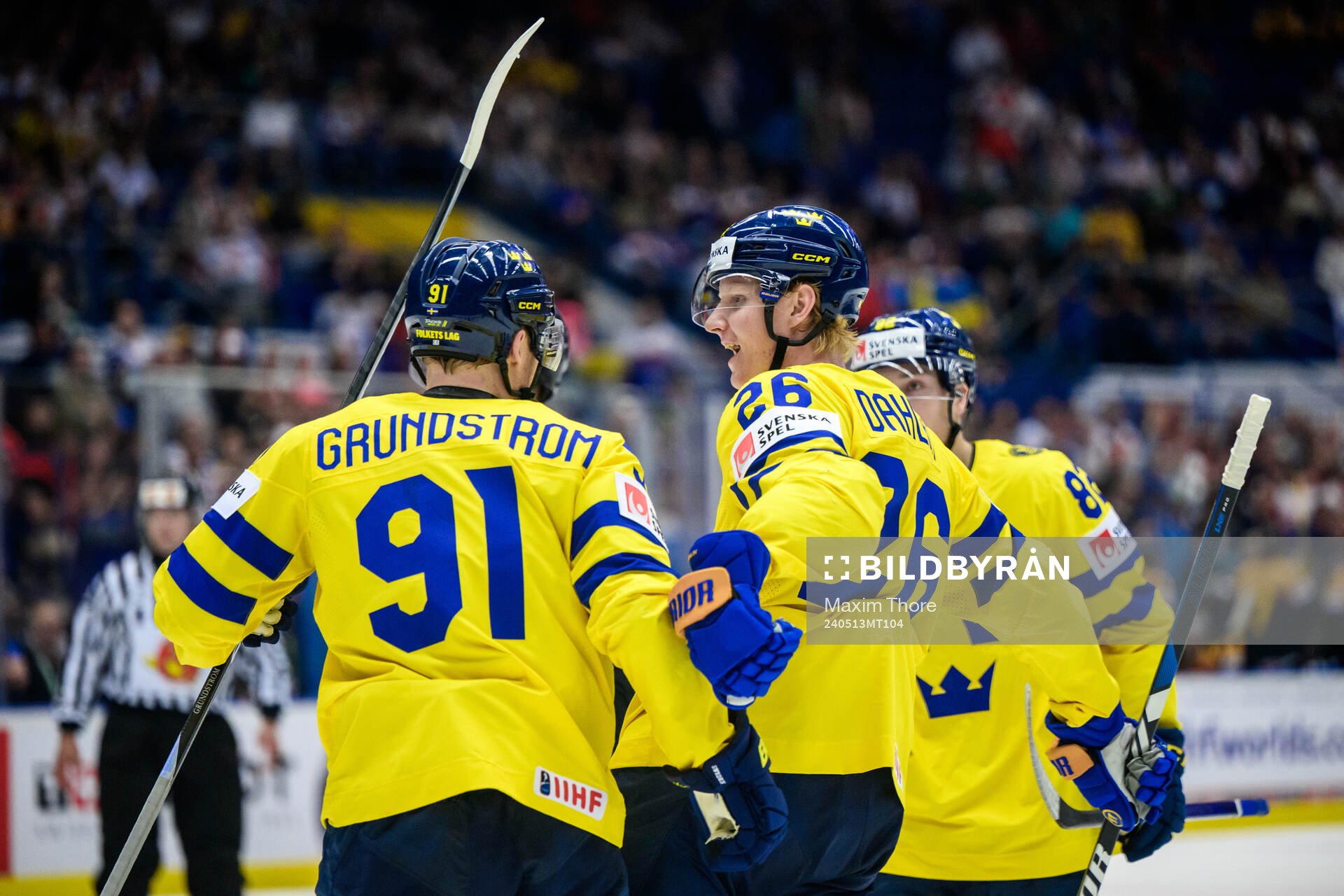 Carl Grundström and Rasmus Dahlin of Sweden celebrate
