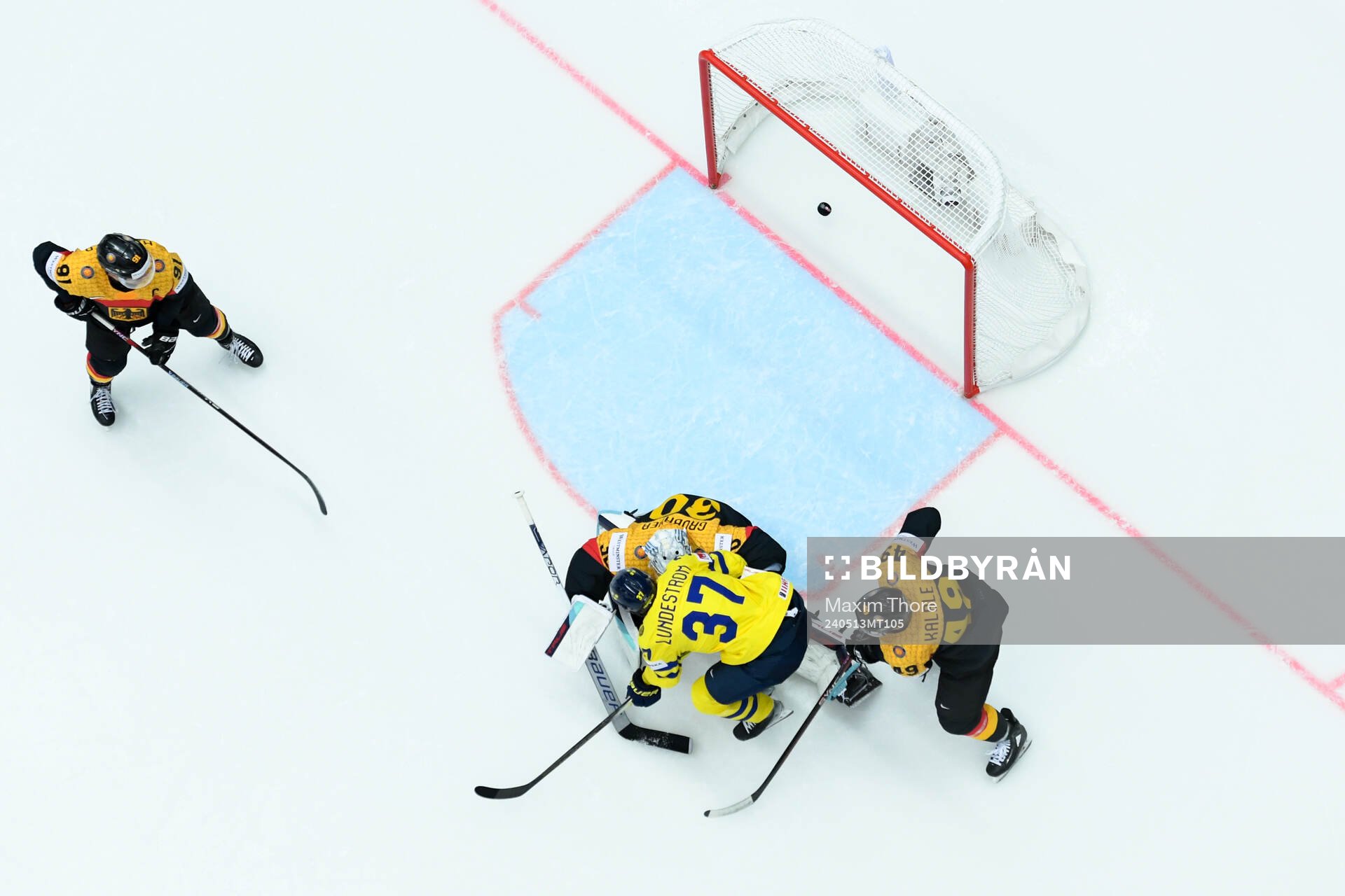 goaltender Philipp Grubauer of Germany and Isac Lundeström