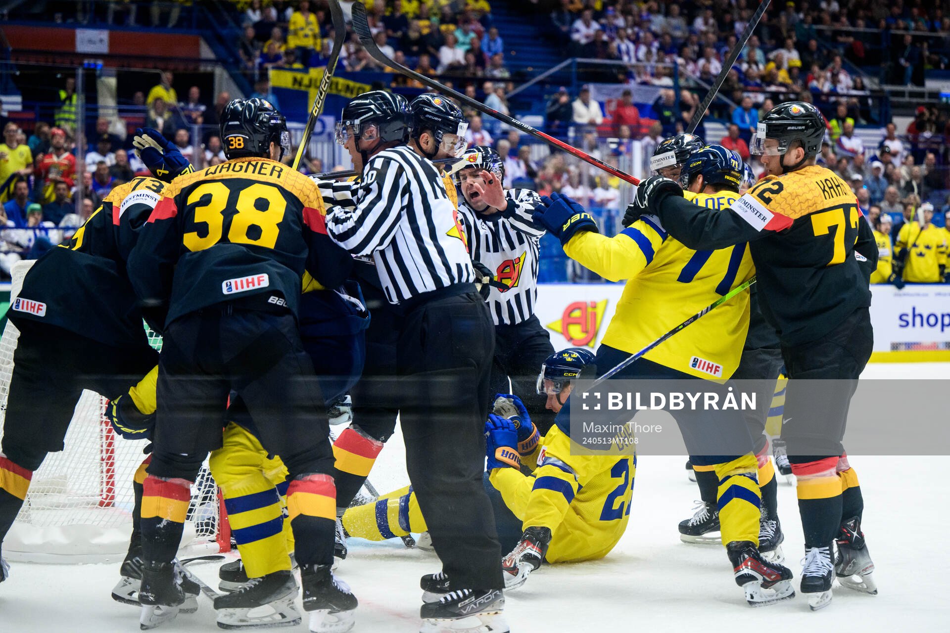 Fighting between players of Germany and of Sweden
