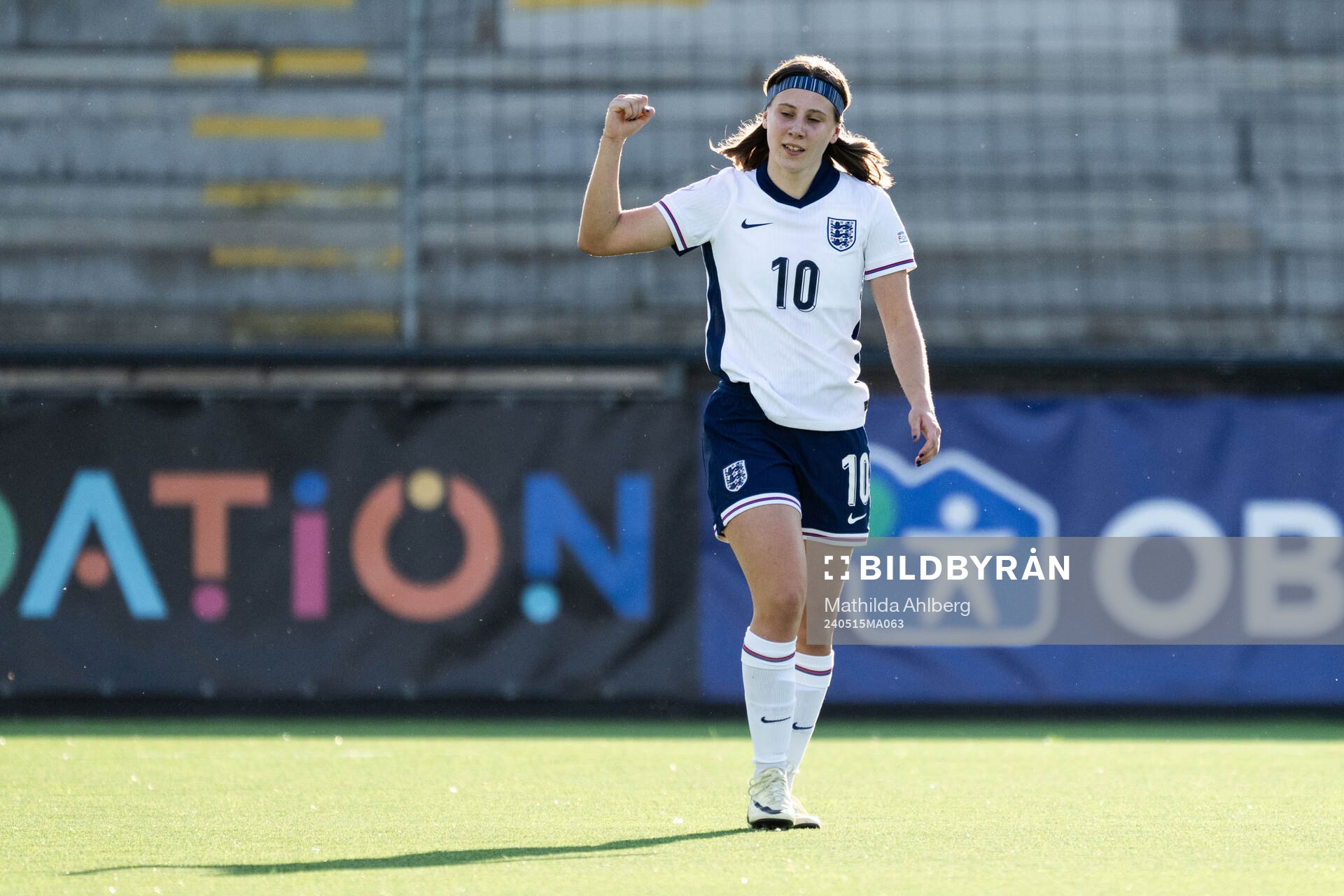 Vera Jones of England celebrates