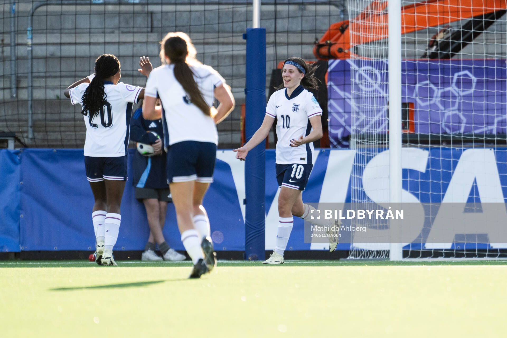 Vera Jones of England celebrates