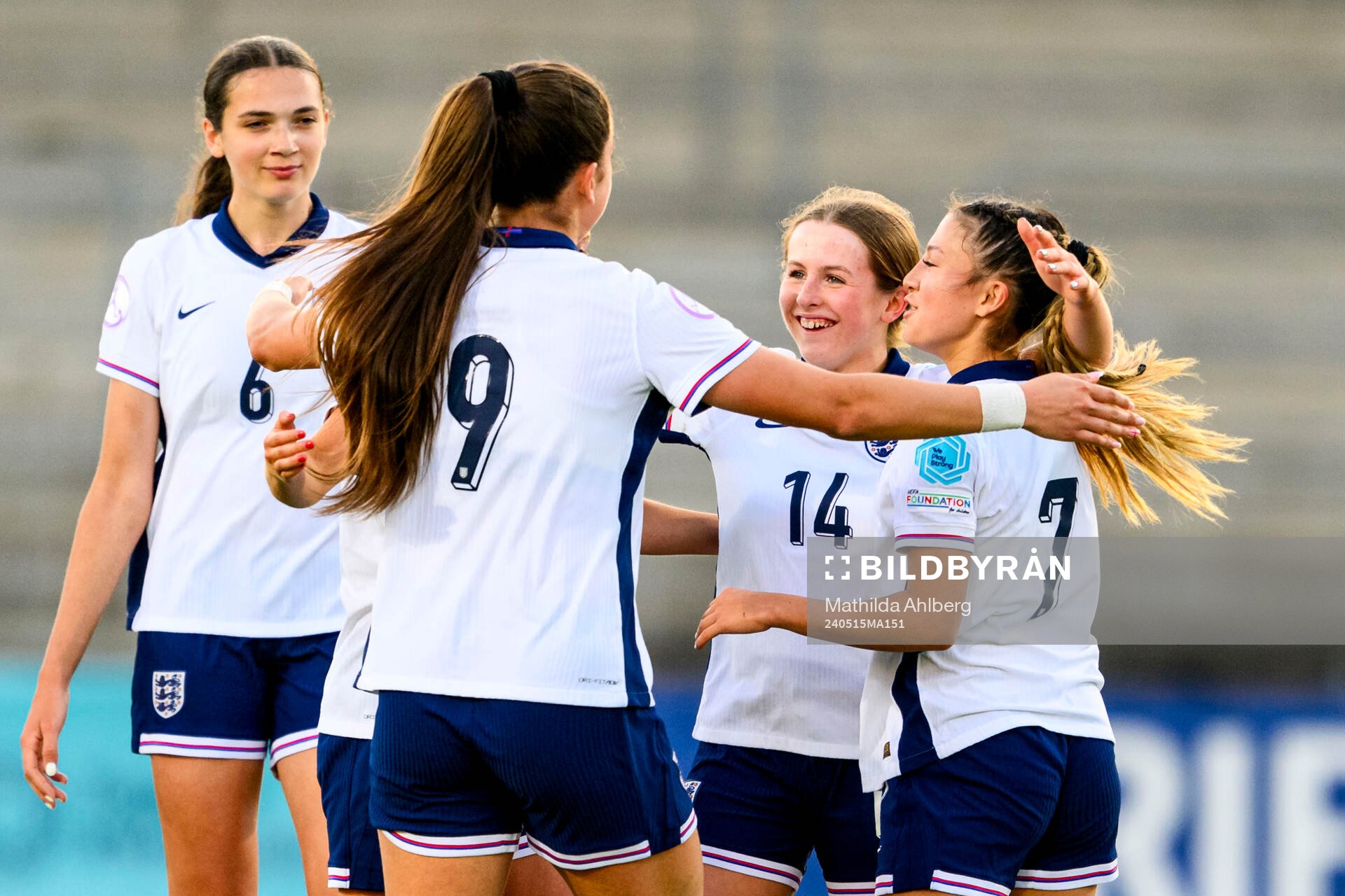 Emily Cassap of England celebrates with teammates