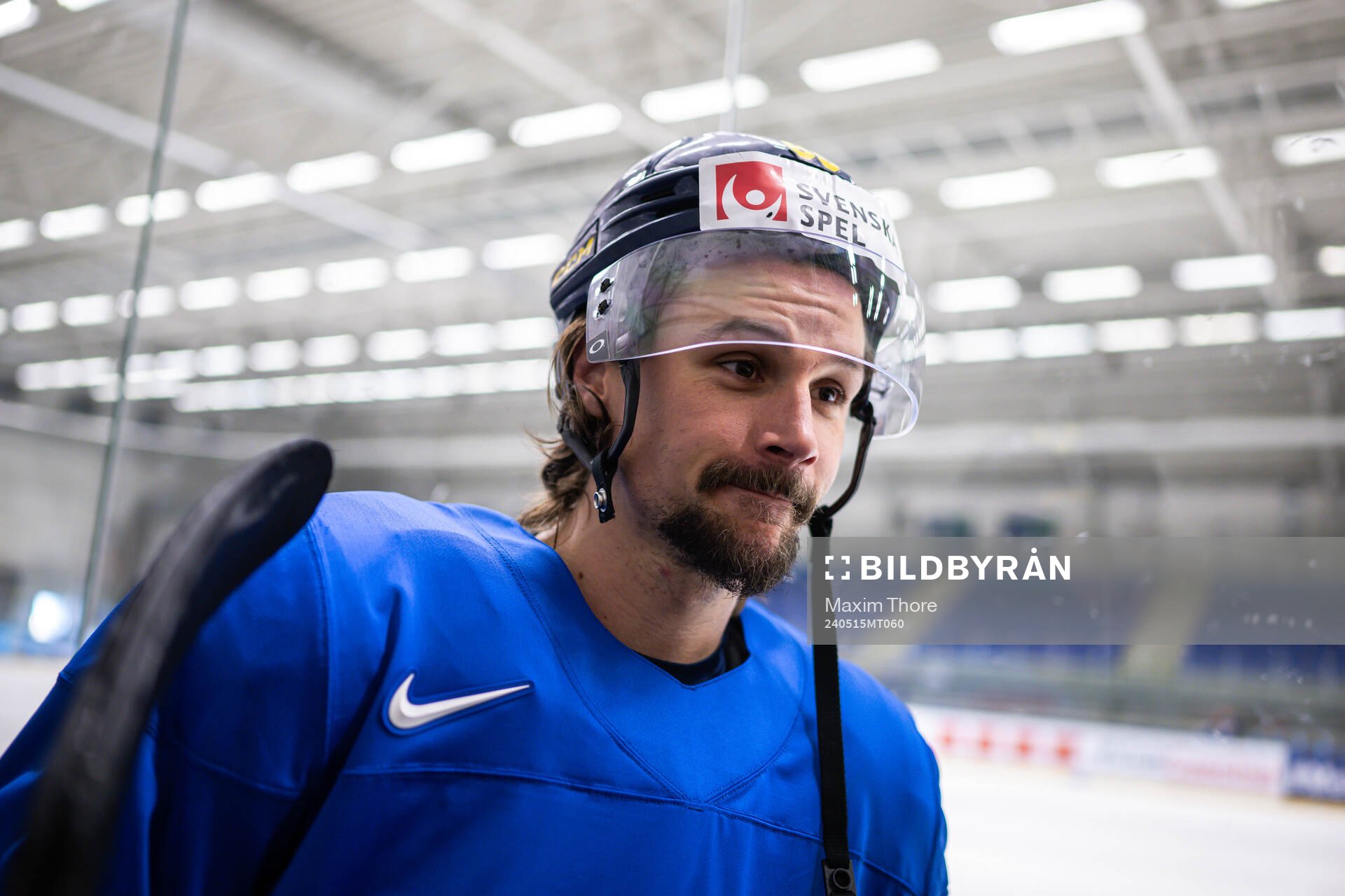 Erik Karlsson of Sweden speaks with media