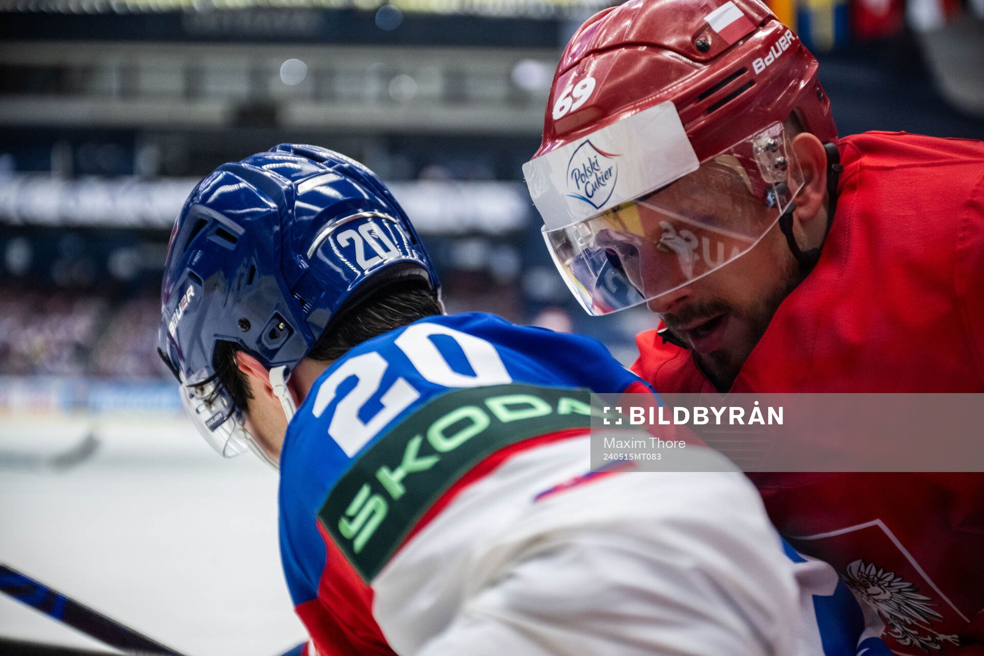 Juraj Slafkovsky of Slovakia and Mateusz Bryk of Poland