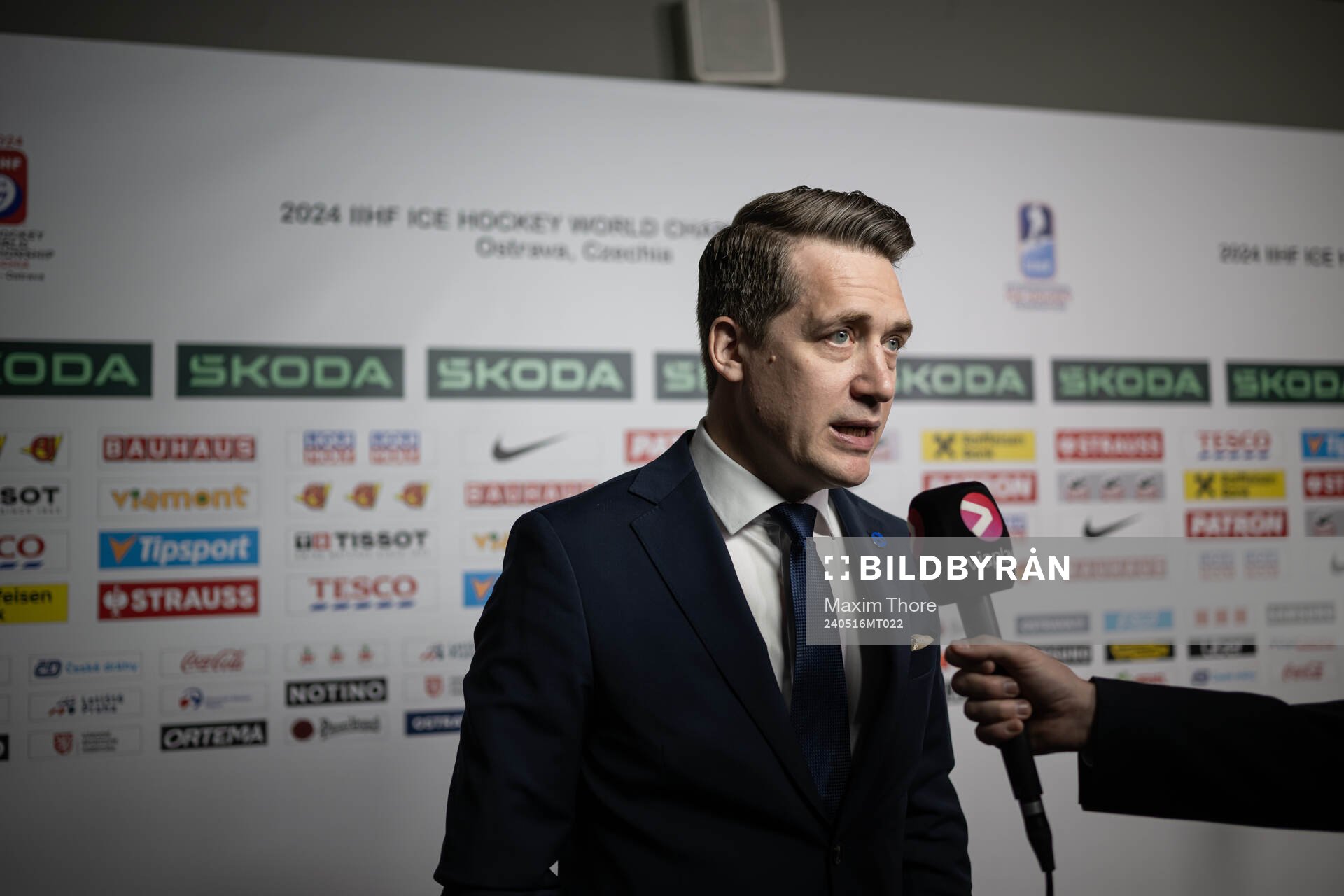 Head coach Sam Hallam of Sweden is interviewed by Swedish