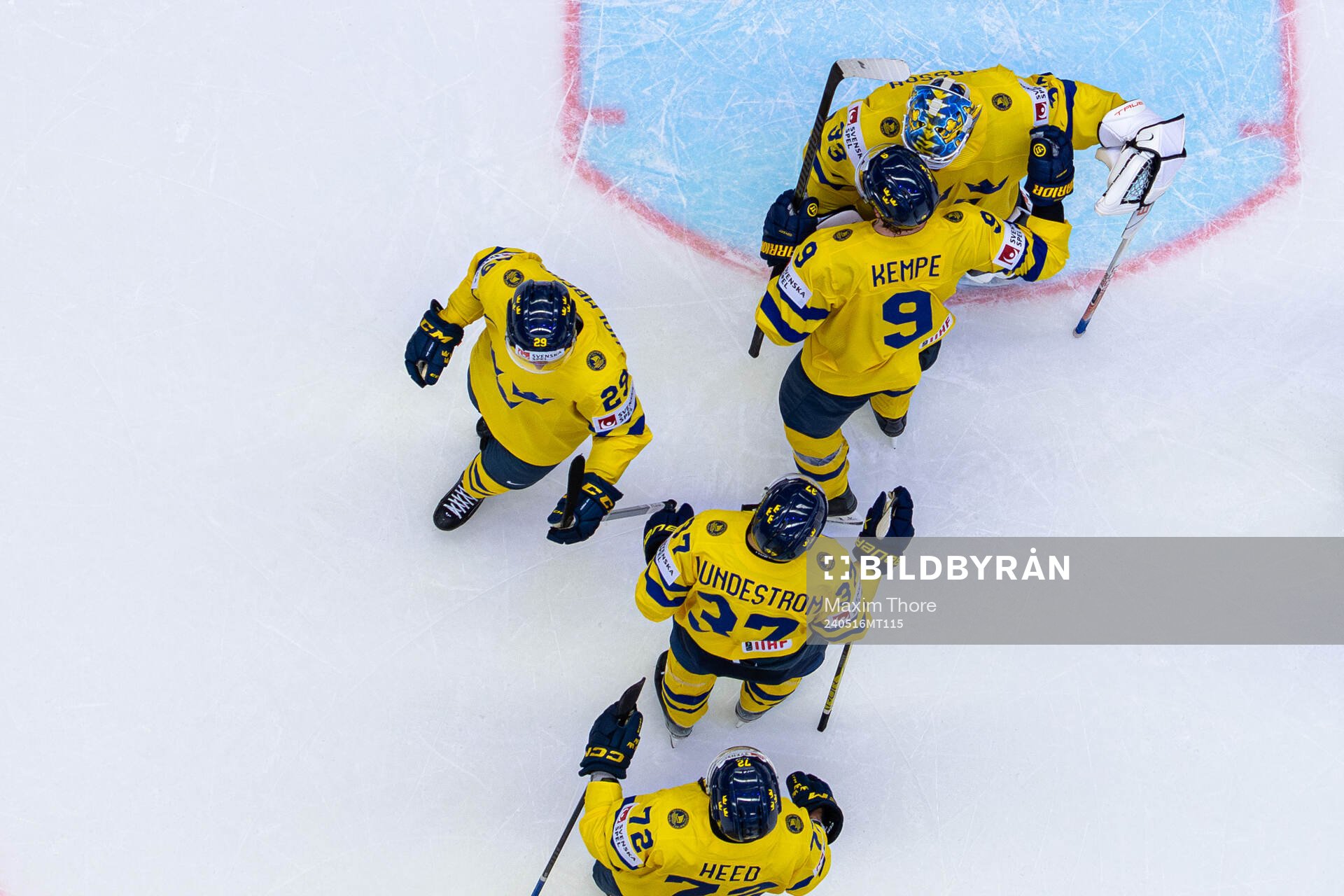 Goaltender Samuel Ersson of Sweden celebrate with Adrian