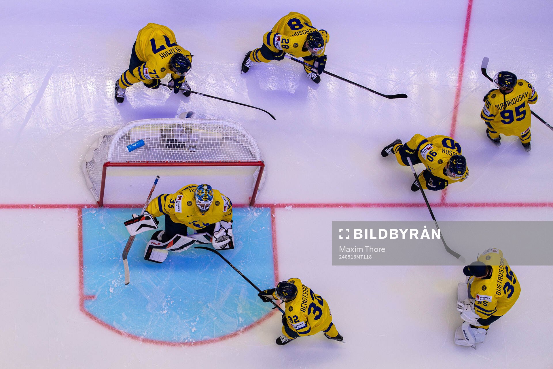 Goaltender Samuel Ersson of Sweden with teammates