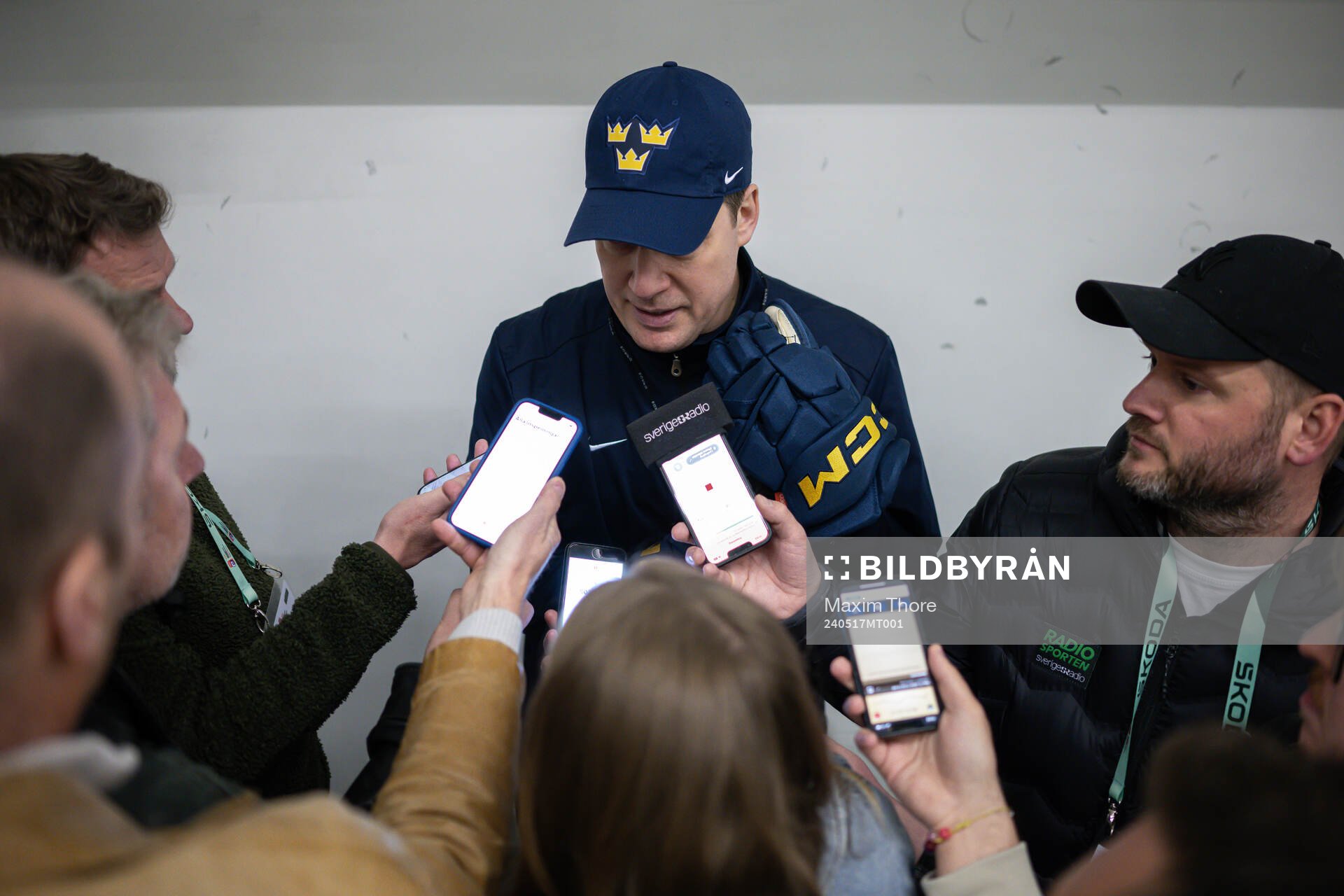 Head coach Sam Hallam of Sweden speaks with media