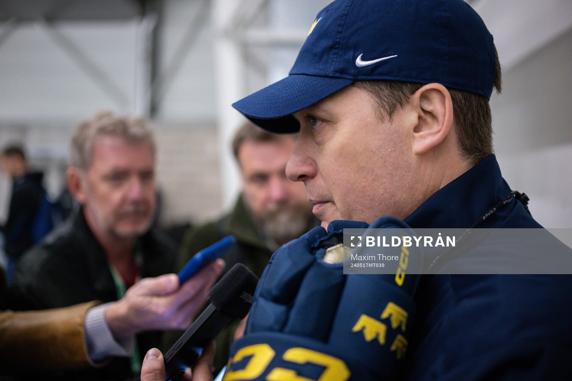 Head coach Sam Hallam of Sweden speaks with media
