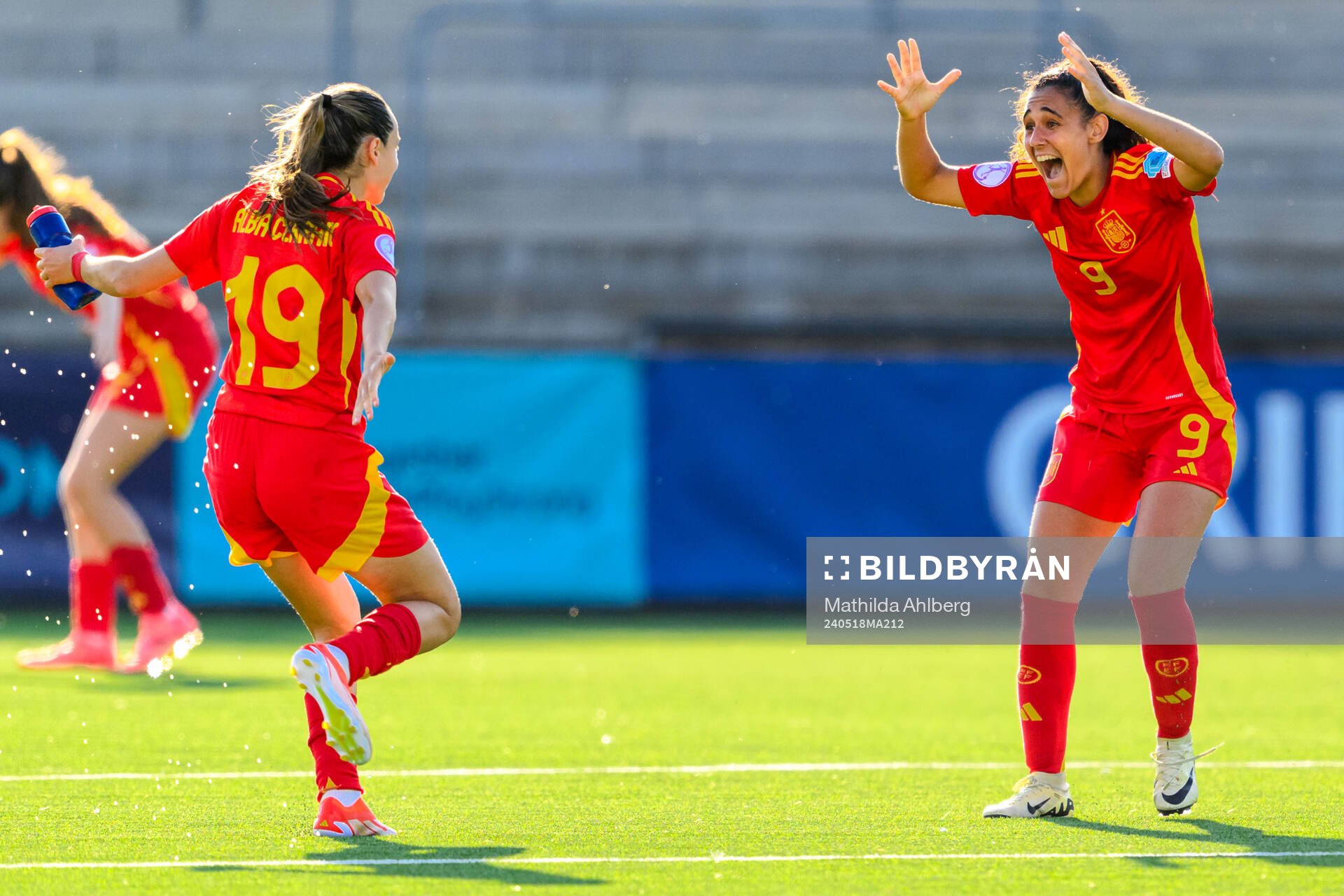 Alba Cerrato and Celia Segura of Spain celebrate