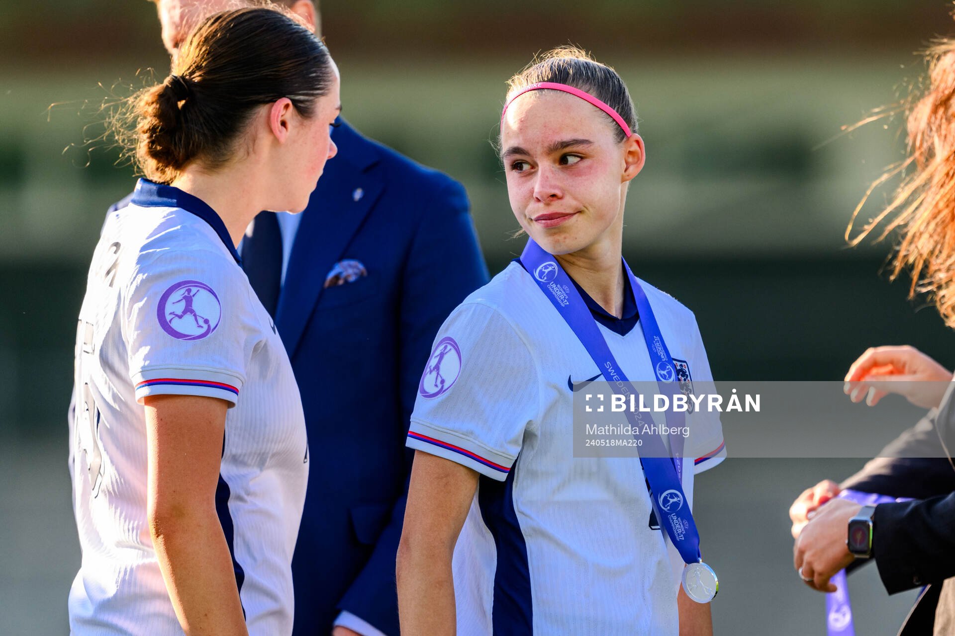 Nelly Las of England looks dejected
