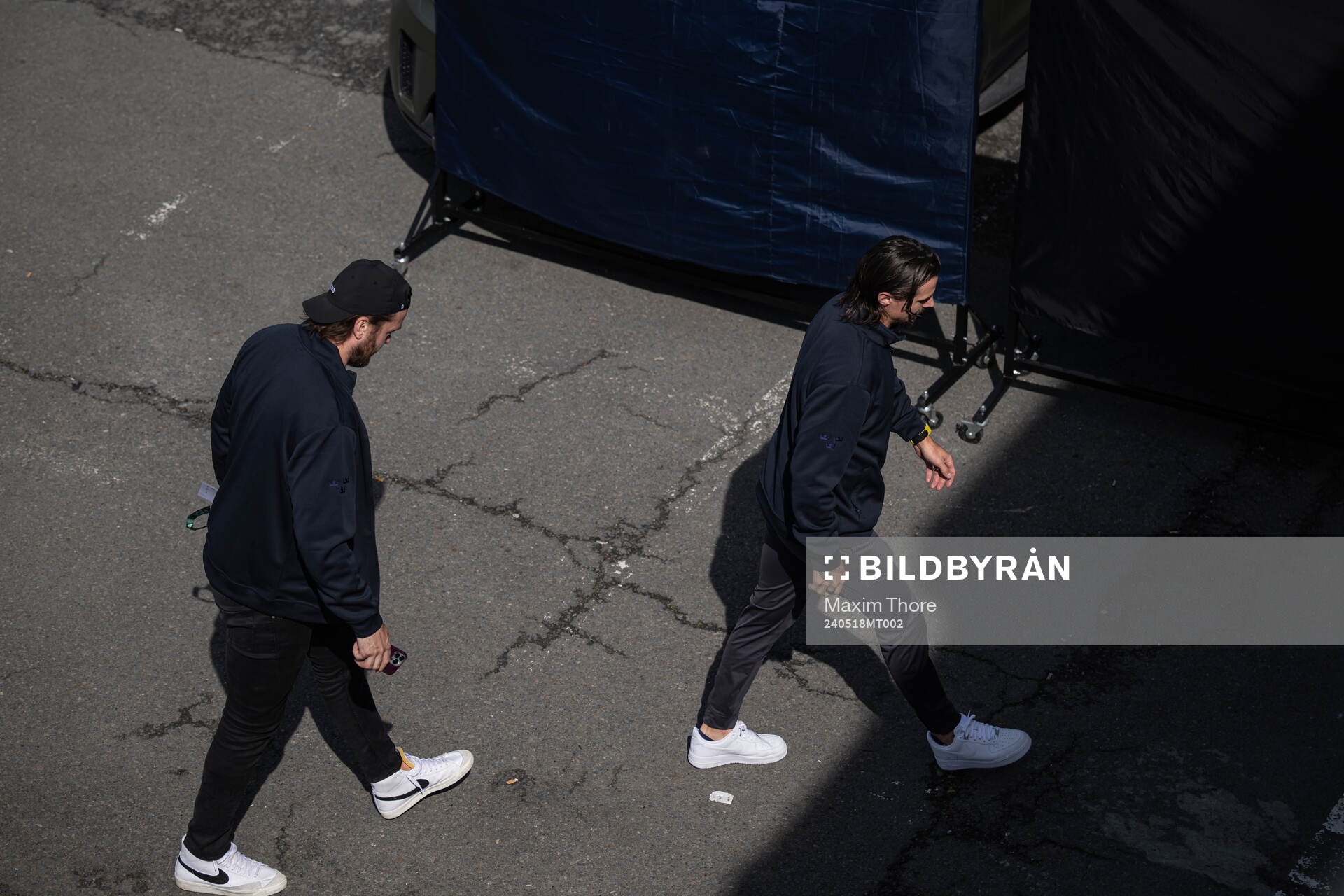 Victor Hedman and Erik Karlsson of Sweden arrive to the