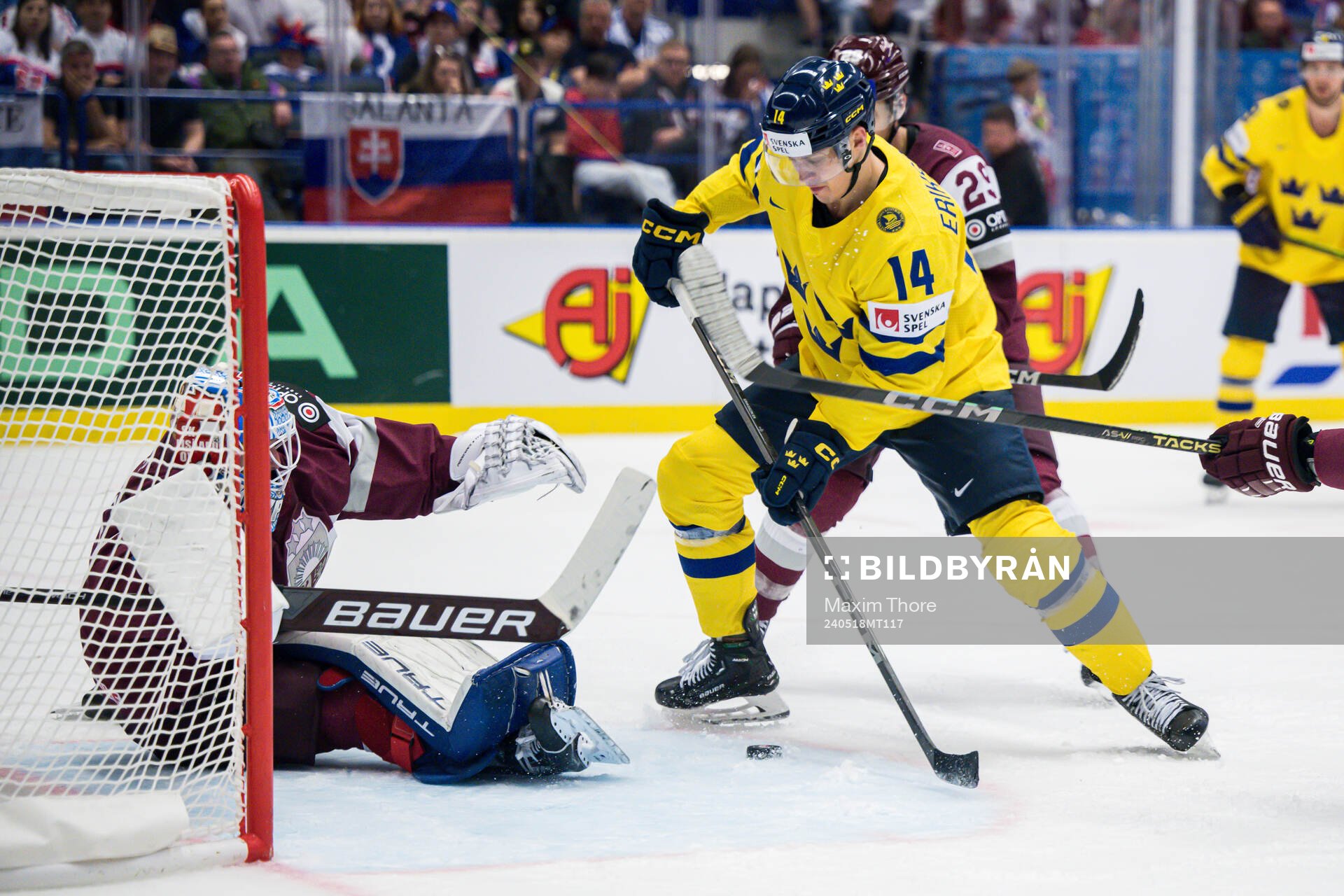 duringgoaltender Kristers Gudlevskis of Latvia and Joel