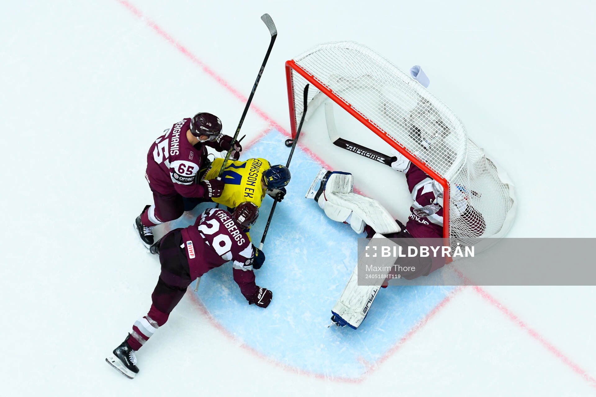 Joel Eriksson Ek of Sweden against Arvils Bergmanis, Ralfs