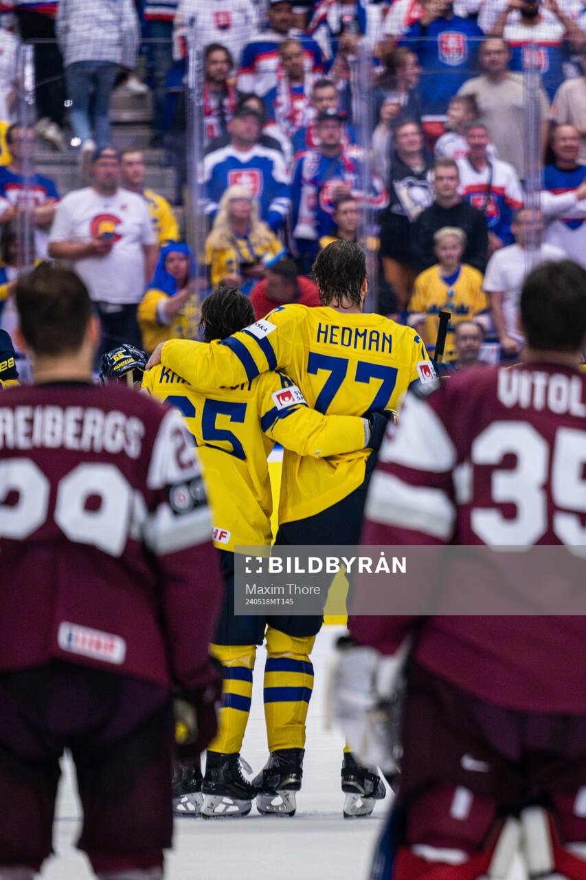 Erik Karlsson and Victor Hedman of Sweden embrace each other