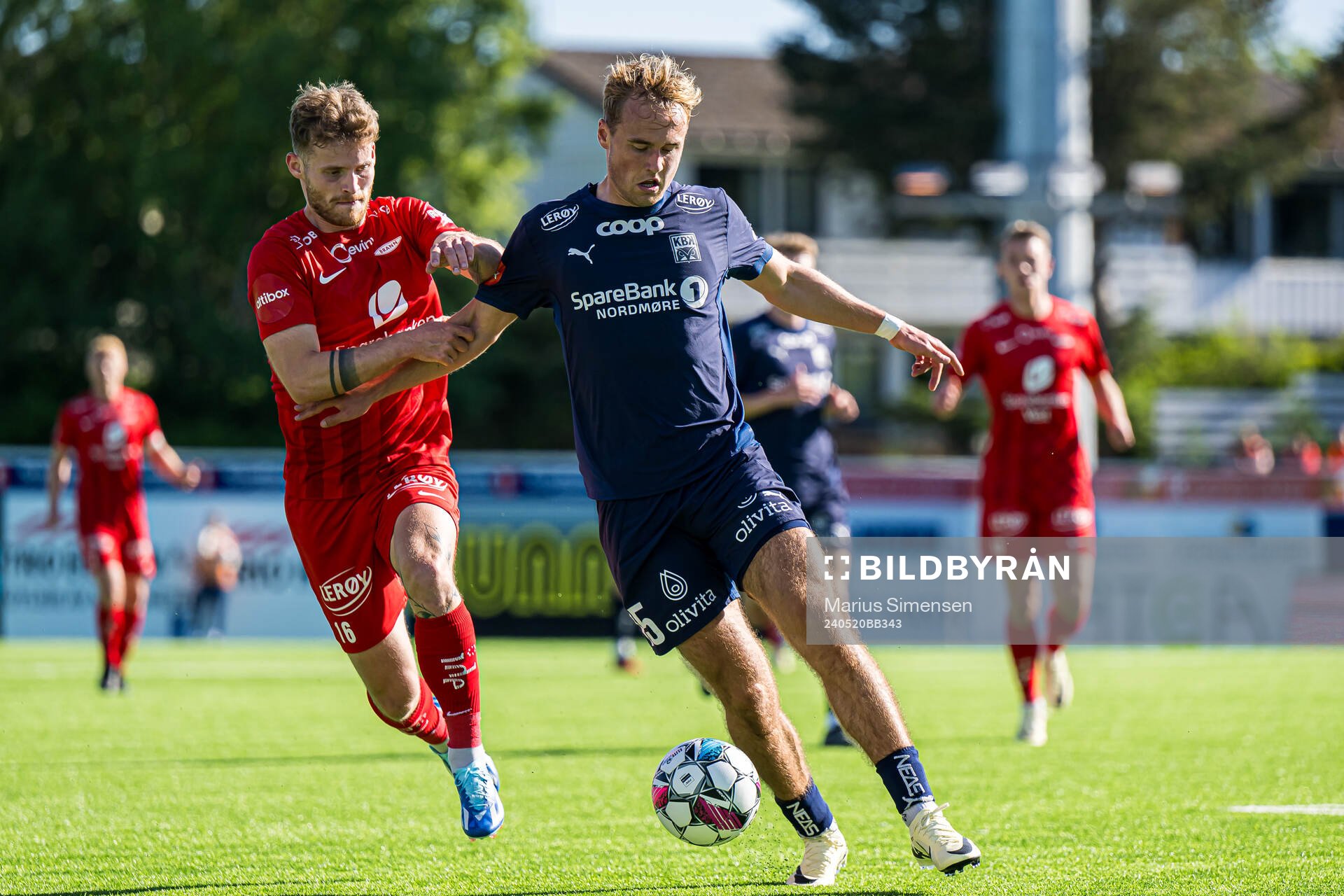 Ole Didrik Blomberg of Brann and Mikkel Rakneberg of Kristiansund during the Eliteserien match between Kristiansund and Brann on May 20, 2024 in Kristiansund.