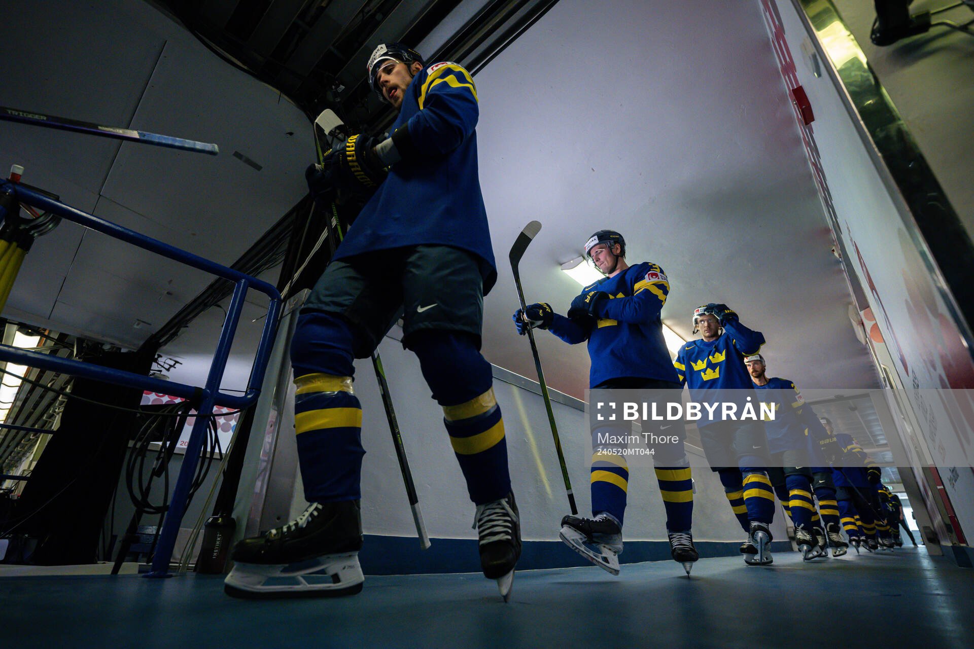 Players of Sweden enter the ice